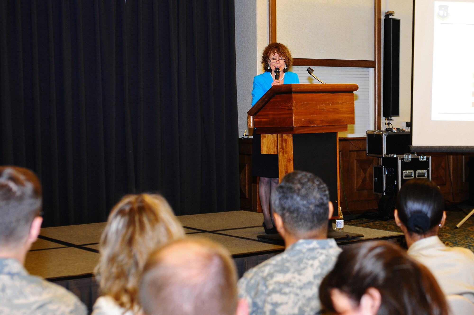 Dr. Dell McMullen, Kaiserslautern District superintendent,  addresses participants during the first Joint Community Town Hall on Ramstein Air Base, Germany, April 3, 2012. The event provided Kaiserslautern Military Community members the opportunity to address issues of mutual concern. (U.S. Air Force photo/Airman Brea Miller)