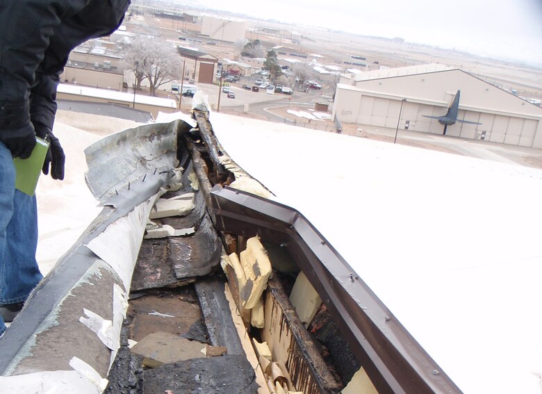 KIRTLAND AIR FORCE BASE, N.M., -- Strong winds in early December 2011 caused damage to the roofs of several buildings.