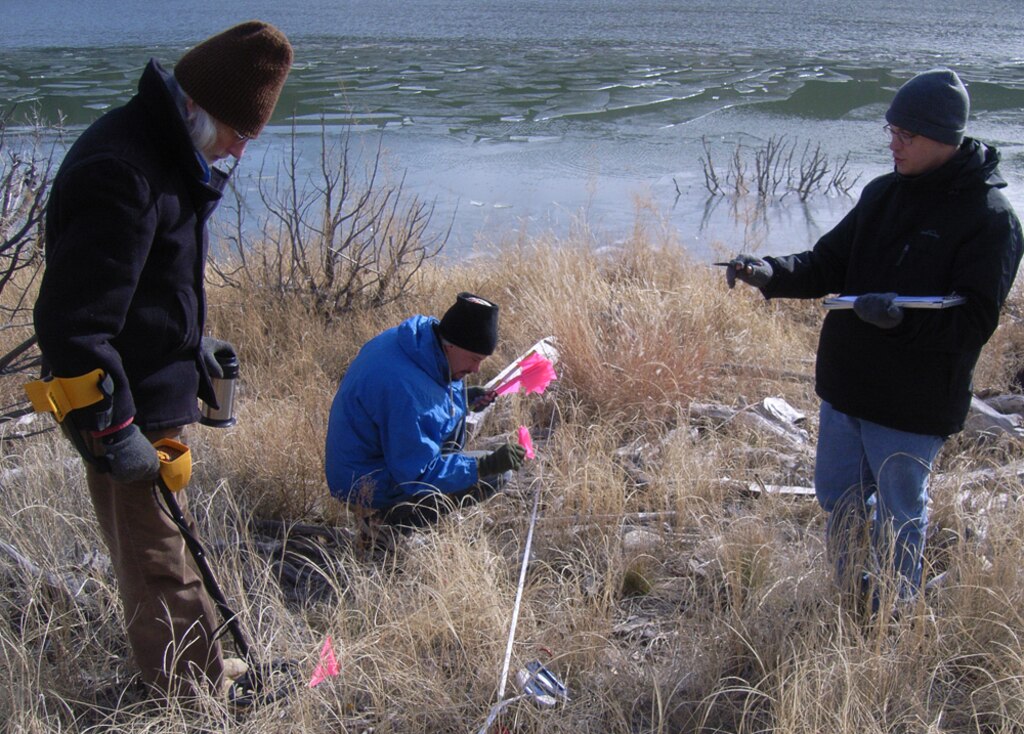 COCHITI LAKE, N.M., -- Albuquerque District archaeologists created an artificial archaeological site along the shore of Cochiti Lake and placed artifacts they made to see the effects from fluctuating lake levels.