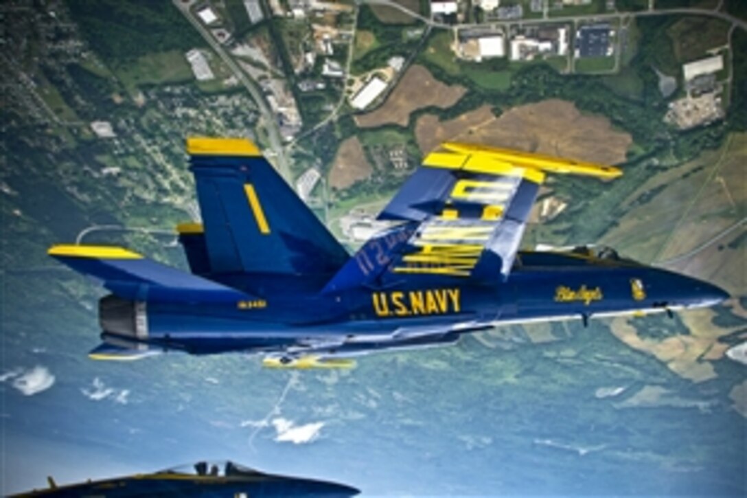 U.S. Navy Capt. Greg McWherter leads a formation of F/A-18 Hornets during the Tuscaloosa Regional Air Show 2012 in Tuscaloosa, Ala., March 30, 2012. McWherter is the commanding officer and flight leader for the Blue Angels, the Navy's flight demonstration squadron.