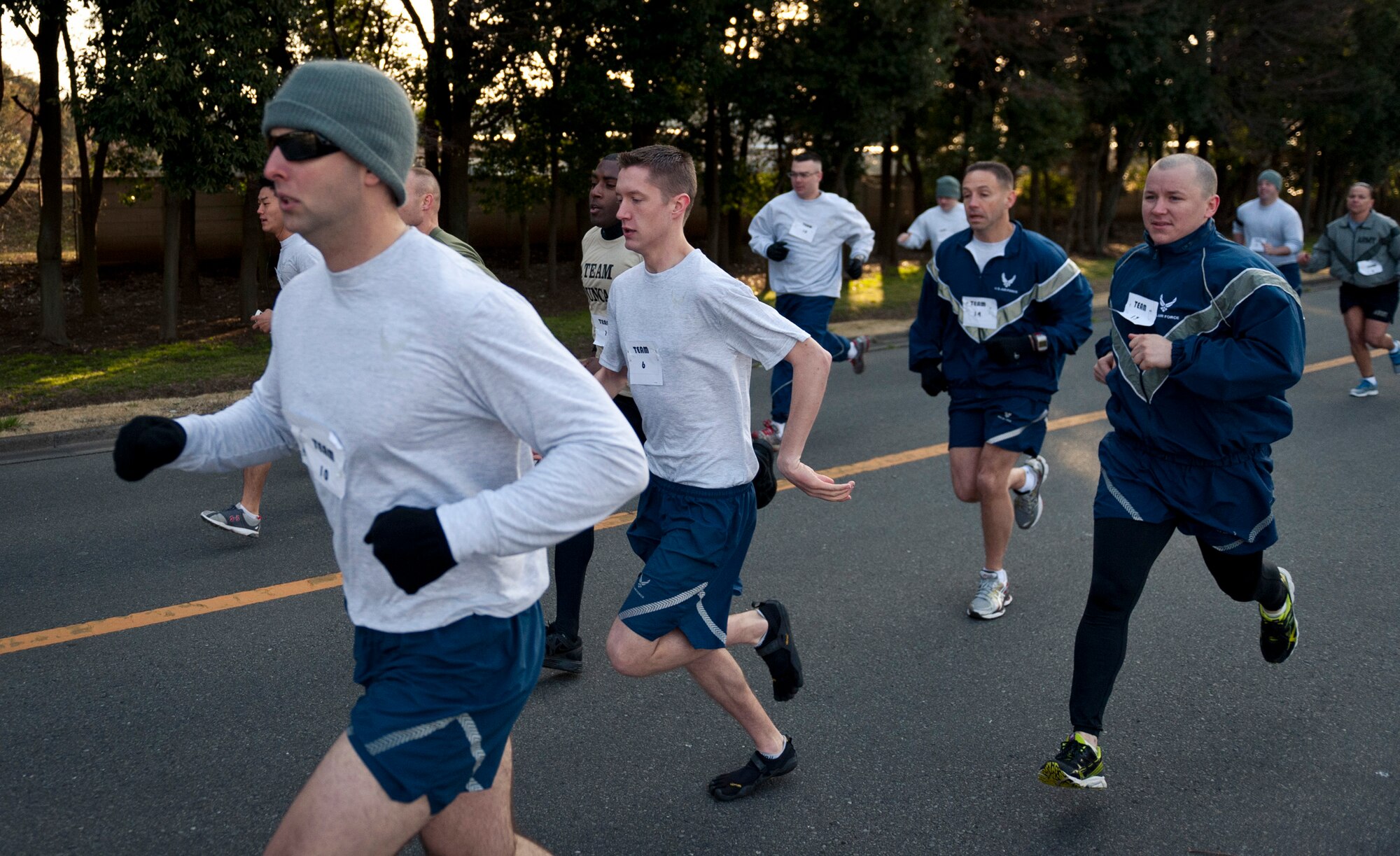 YOKOTA AIR BASE, Japan -- Runners start a 5K relay race at Yokota Field, Yokota Air Base, Japan, April 2, 2012. The 374th Airlift Wing sexual assault response coordination office held the 5K relay race to kick off Sexual Assault Awareness Month. (U.S. Air Force photo/Staff Sgt. Samuel Morse)