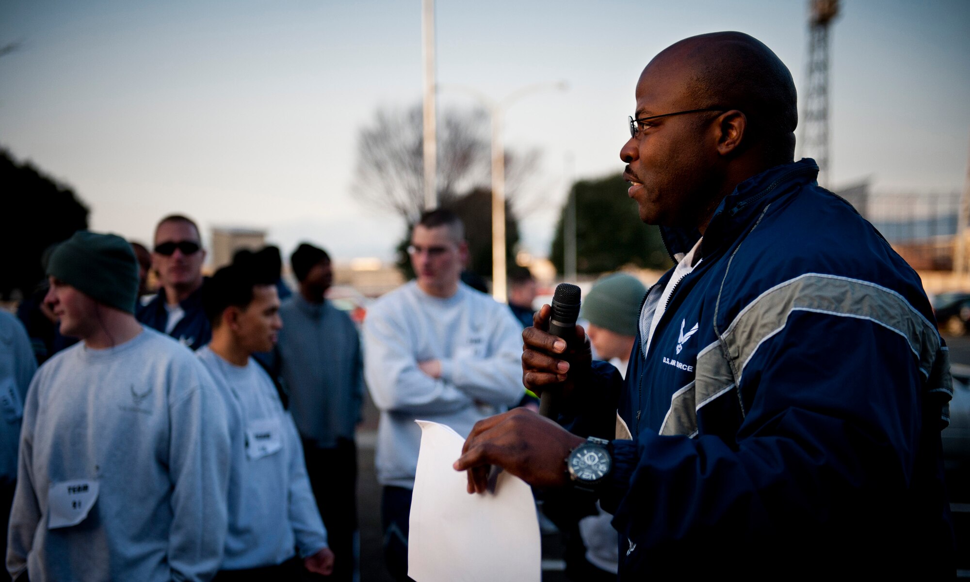 YOKOTA AIR BASE, Japan -- Staff Sgt Charlton Nelson, 374th Airlift Wing sexual assault response coordination assistant, tells entrants about the rules of a 5K relay race starting at Yokota Field, Yokota Air Base, Japan, April 2, 2012. The 374th AW sexual assault response coordination office held the 5K relay race to kick off Sexual Assault Awareness Month. (U.S. Air Force photo/Staff Sgt. Samuel Morse)