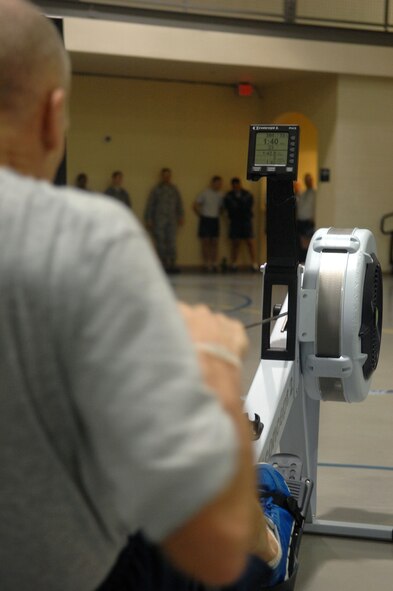 Airmen participate in the Air Force Global Strike Command American 300 Never Quit Series Rowing Challenge at the fitness center on Barksdale Air Force Base, La. April 5. The one month challenge is to see which AFGSC base can row the most meters. The base that rows the furthest will win $50,000. (U.S. Air Force photo/Airman 1st Class Joseph A. Pagán Jr.)(RELEASED)