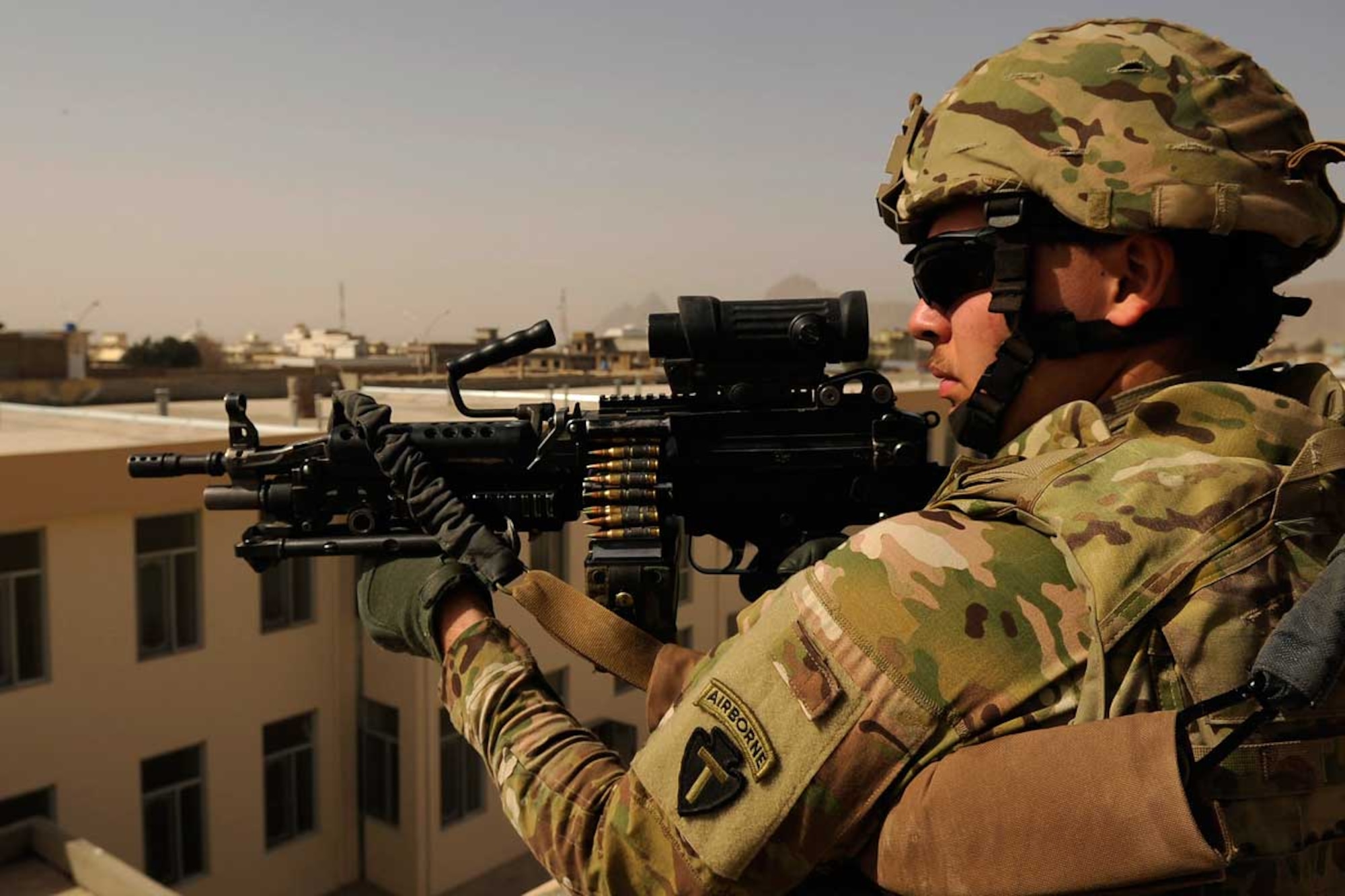 Alaskan National Guard Pfc. Laurence Yeaton provides security while members of the Kandahar Provincial Reconstruction Team’s engineering department conduct a site assessment of a future midwifery facility March 6 in Kandahar, Afghanistan. Kandahar PRT is a joint team of U.S. Air Force, Army, Navy service members and civilians from various U.S. agencies deployed to the Kandahar providence of Afghanistan to assist in the effort to rebuild and stabilize the local government and infrastructure. (U.S. Air Force photo/Staff Sgt. Timothy Chacon)