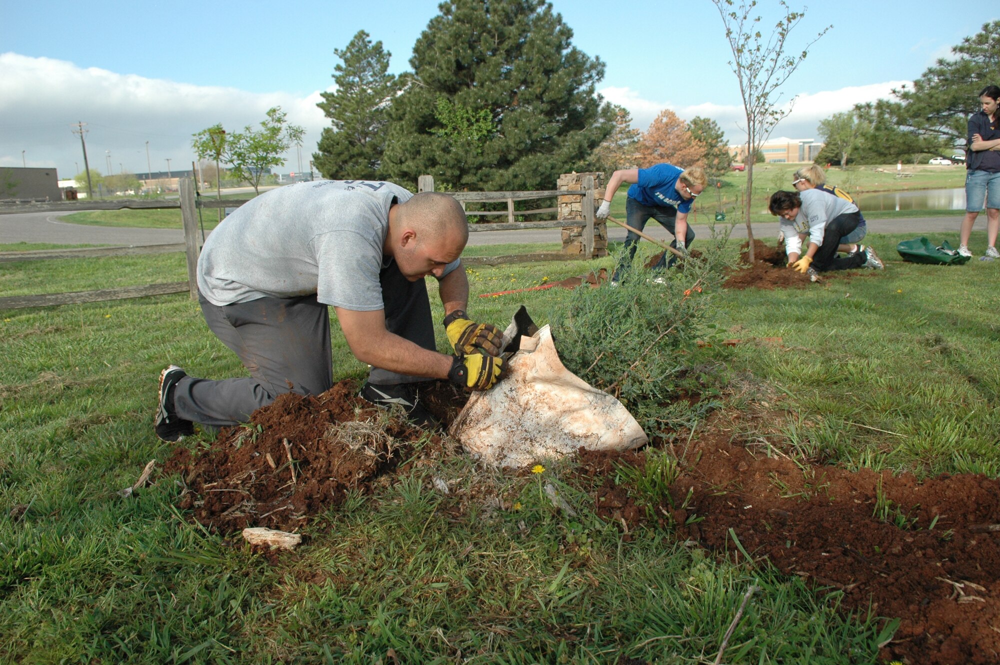 Volunteers from Rose State College and Tinker AFB, planted trees for the Arbor Day foundation on Tinker March 30. Tinker was recognized as a Tree City USA by the Arbor Day Foundation for the 19th year in a row.  (Air Force photo by Brion Ockenfels)
 