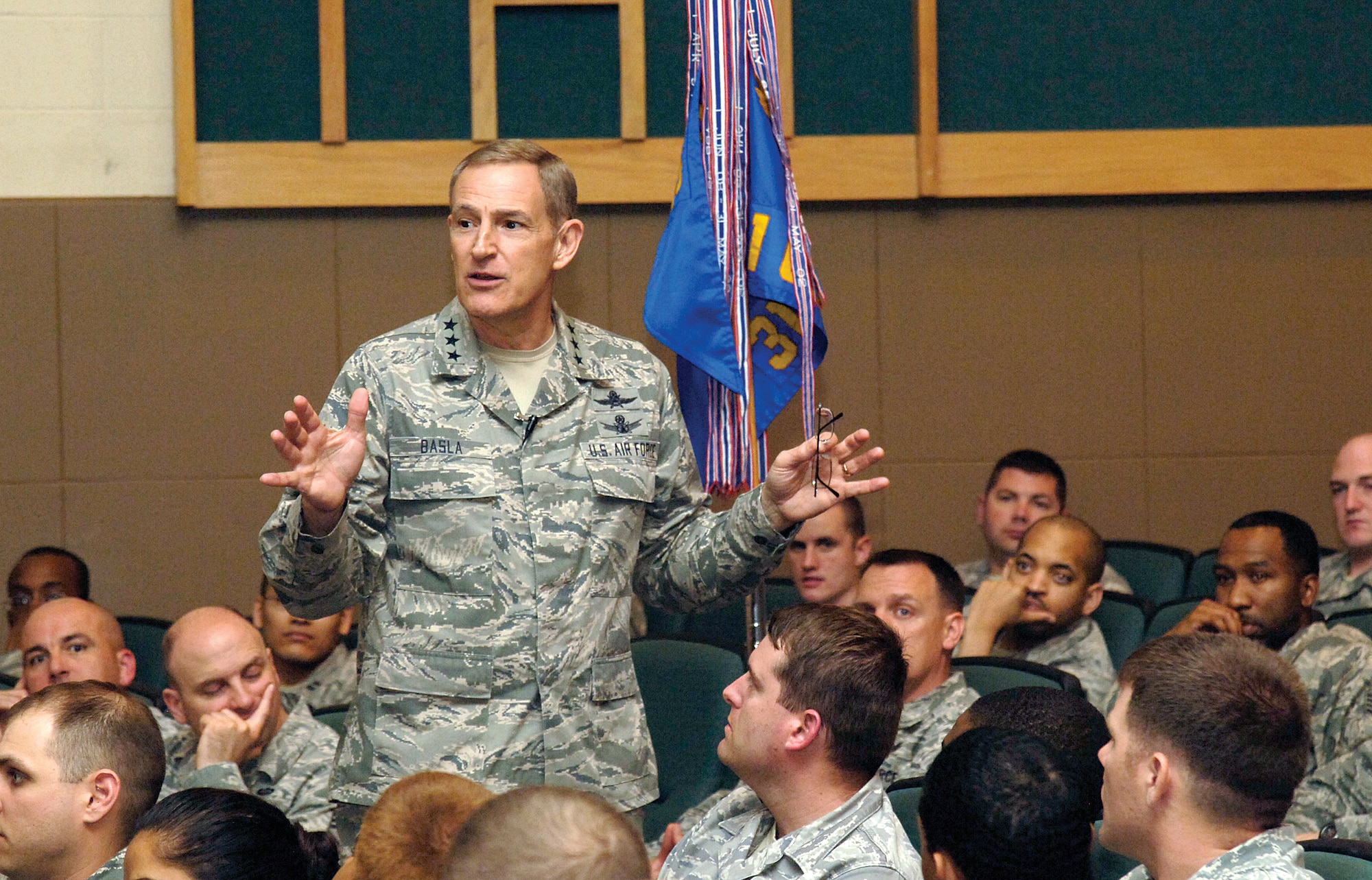 Lt. Gen. Michael Basla, Air Force Space Command vice commander, speaks to 3rd Combat Communication Group Airmen March 28 during a visit to Tinker.  The general was here to discuss the impending inactivation of the Herd and address concerns as he took questions from the Airmen.  The commander also heaped praise on the group and its heritage, with a long list of accomplishments during war and when they offered aid to humanitarian needs around the globe. (Air Force photo by Margo Wright)