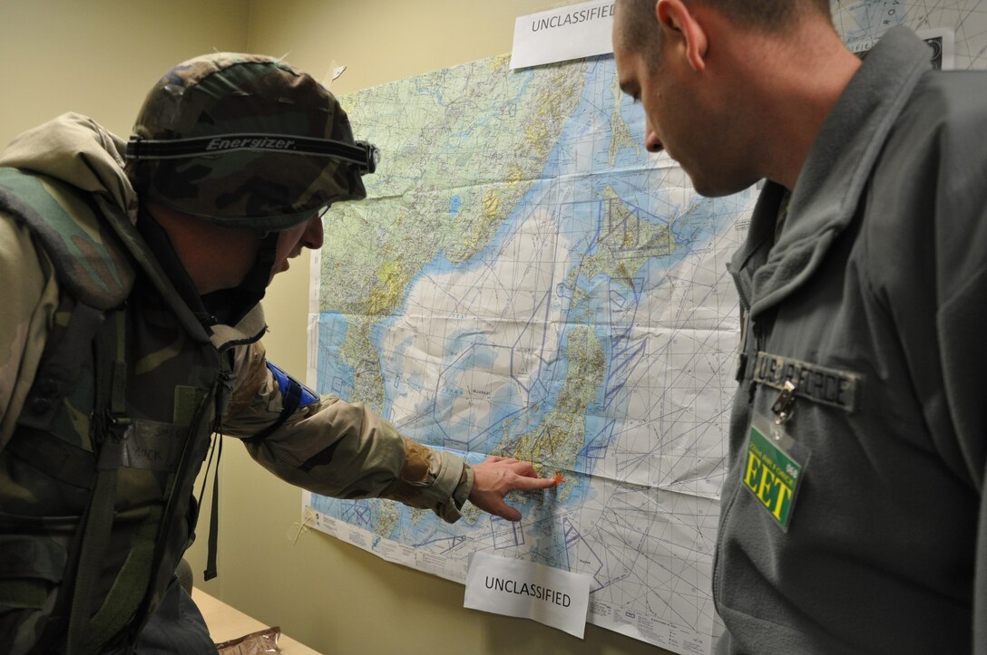 2nd Lt. Ryan Gallagher (right), an intelligence officer with the 910th Operations Support Squadron, discusses exercise information with Senior Master Sgt. Michael Mock, a reservist with the 914th Airlift Wing, Niagara Falls Air Reserve Station, N.Y., April 3.

Gallagher and approximately 29 other 910th Airlift Wing Airmen participated as an Exercise Evaluation Team March 29–April 4, at Alpena Combat Readiness Training Center, Mich. The team evaluated Air Force Reservists and Air National Guardsmen from Niagara Falls Air Reserve Station, N.Y., who demonstrated their war skills during an Operational Readiness Exercise. U.S. Air Force photo by Maj. Colleen VanNatta