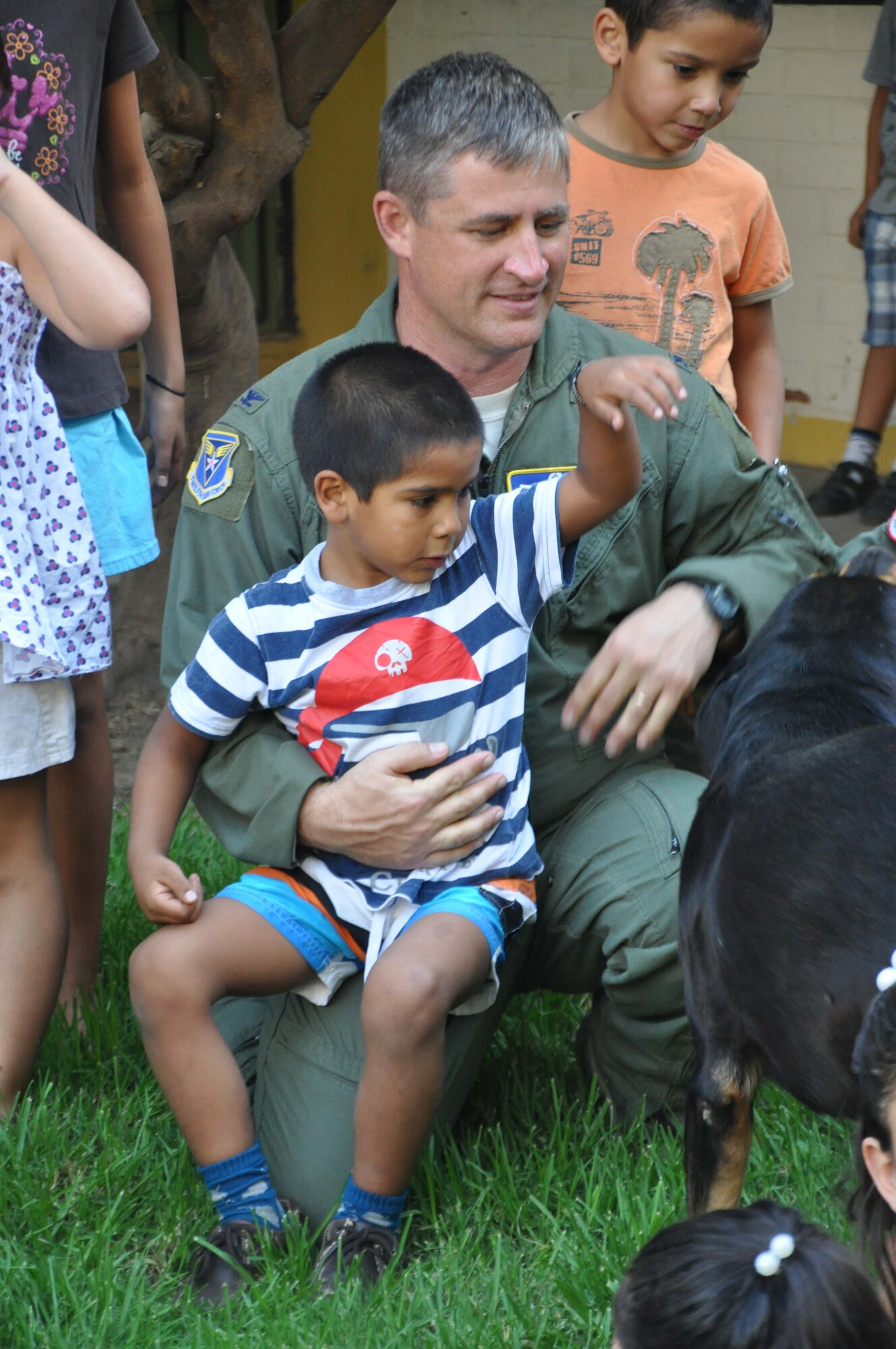 SANTIAGO, Chile – Col. Stephen Pedrotty, 12th Air Force (Air Forces Southern) Air Boss/A3 director, visited children to teach them about space partnerships at the SOS Aldeas orphanage in Santiago, Chile, March 29. The Chilean air force invited U.S. Airmen to help them give back to the community by visiting local hospitals and orphanages this week.  (U.S. Air Force photo/Master Sgt. Kelly Ogden)