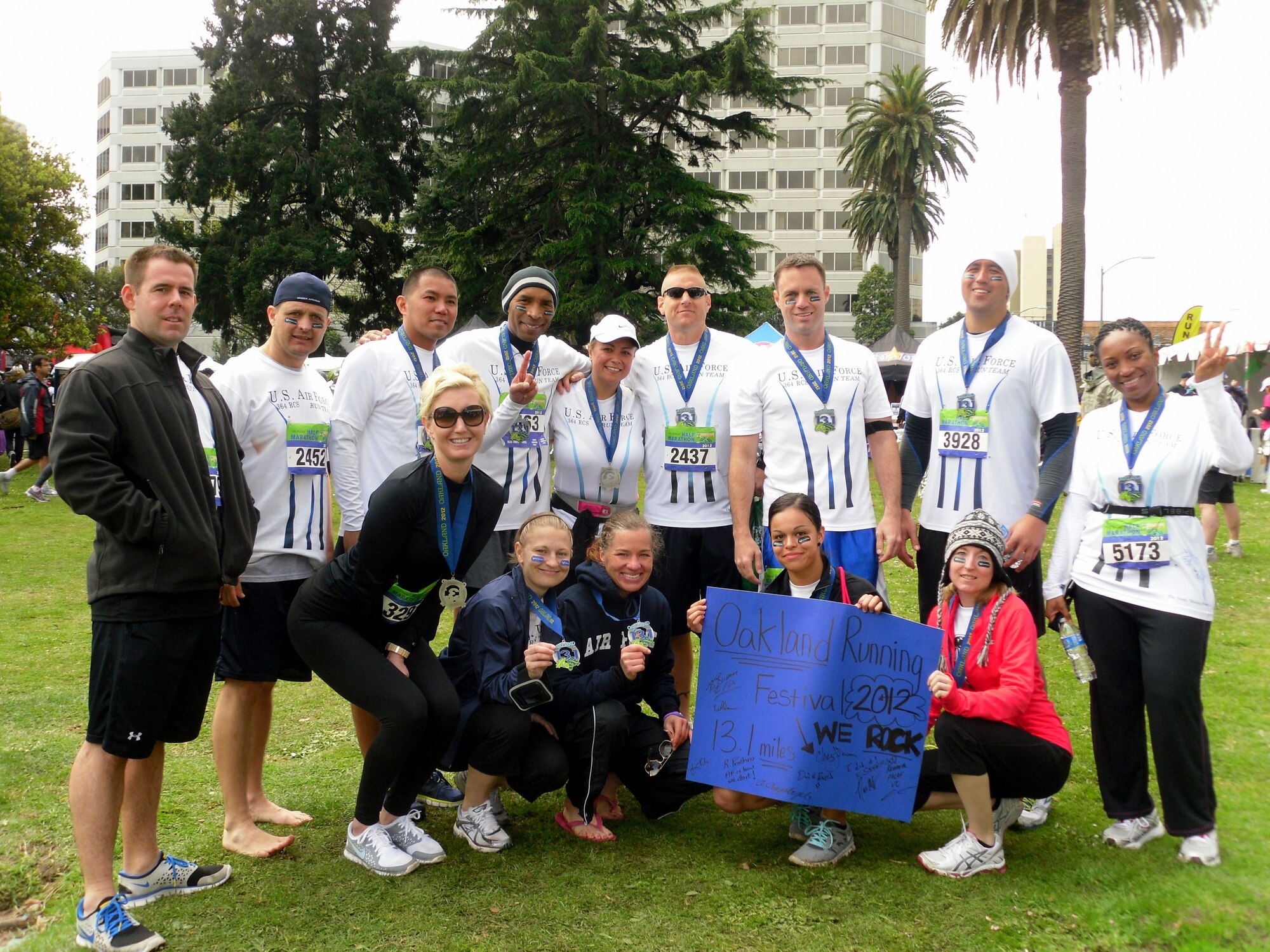 Members of the 364th Recruiting Squadron pose after finishing the half-marathon run during the 2012 Oakland Running Festival.  Sixteen squadron members ran the half-marathon to raise money for charity while 19 squadron members served as race volunteers. (U.S. Air Force photo/Tech. Sgt. Leo Morales)