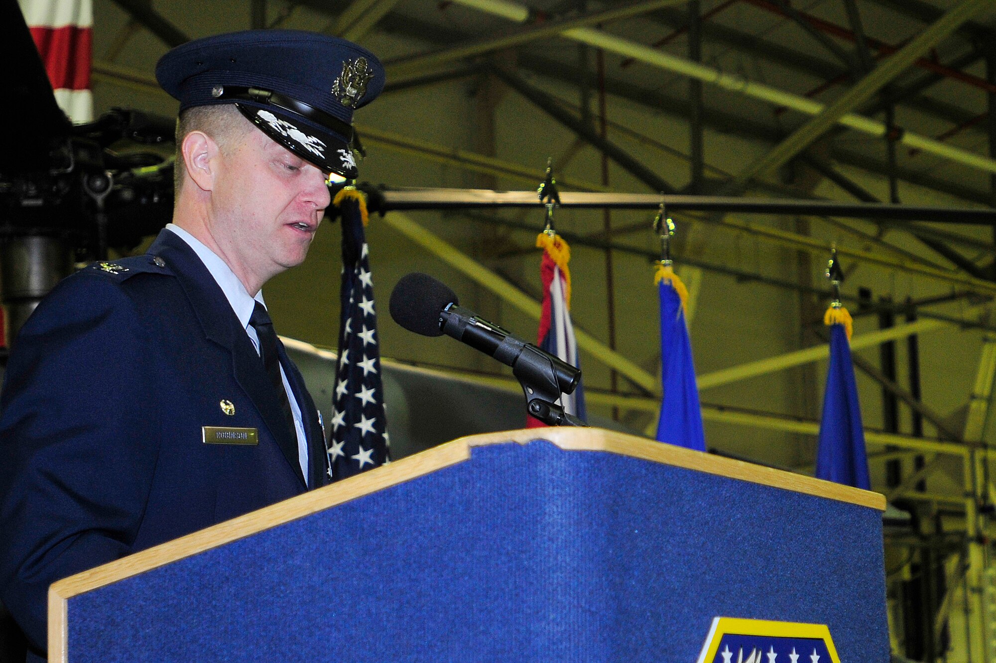 ROYAL AIR FORCE LAKENHEATH, England - Col. Kyle Robinson, 48th Fighter Wing commander, delivers his first speech as commander before approximately 500 people during the 48th FW change of command ceremony April 5, 2012. (U.S. Air Force photo by Senior Airman Tiffany M. Deuel)