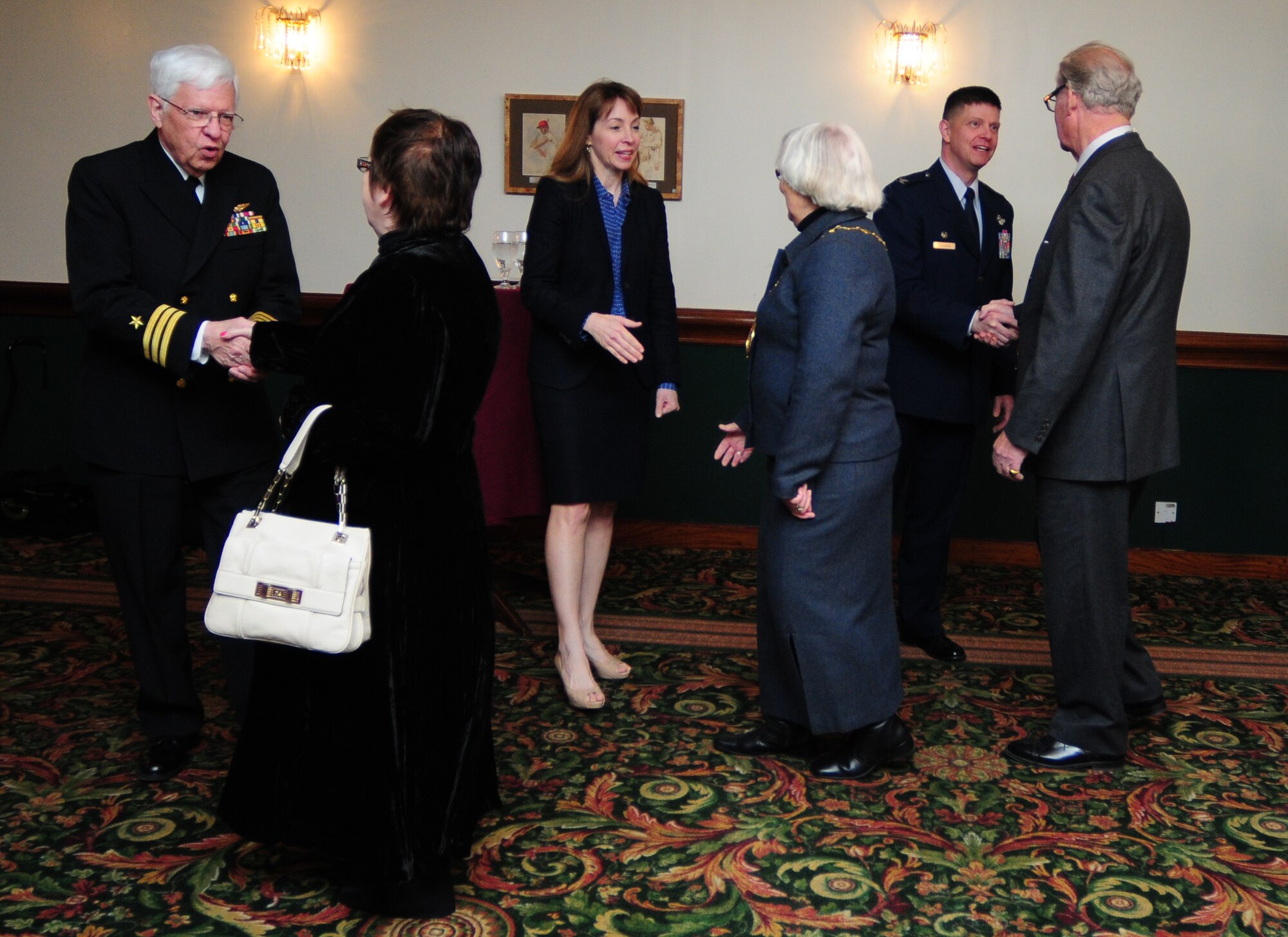 ROYAL AIR FORCE LAKENHEATH, England - Col. Kyle Robinson, 48th Fighter Wing commander, and his wife Maureen greet local dignitaries during the 48th Fighter Wing change of command post-reception at Eagle's Landing April 5, 2012. (U.S. Air Force photo by Senior Airman Lausanne Morgan)