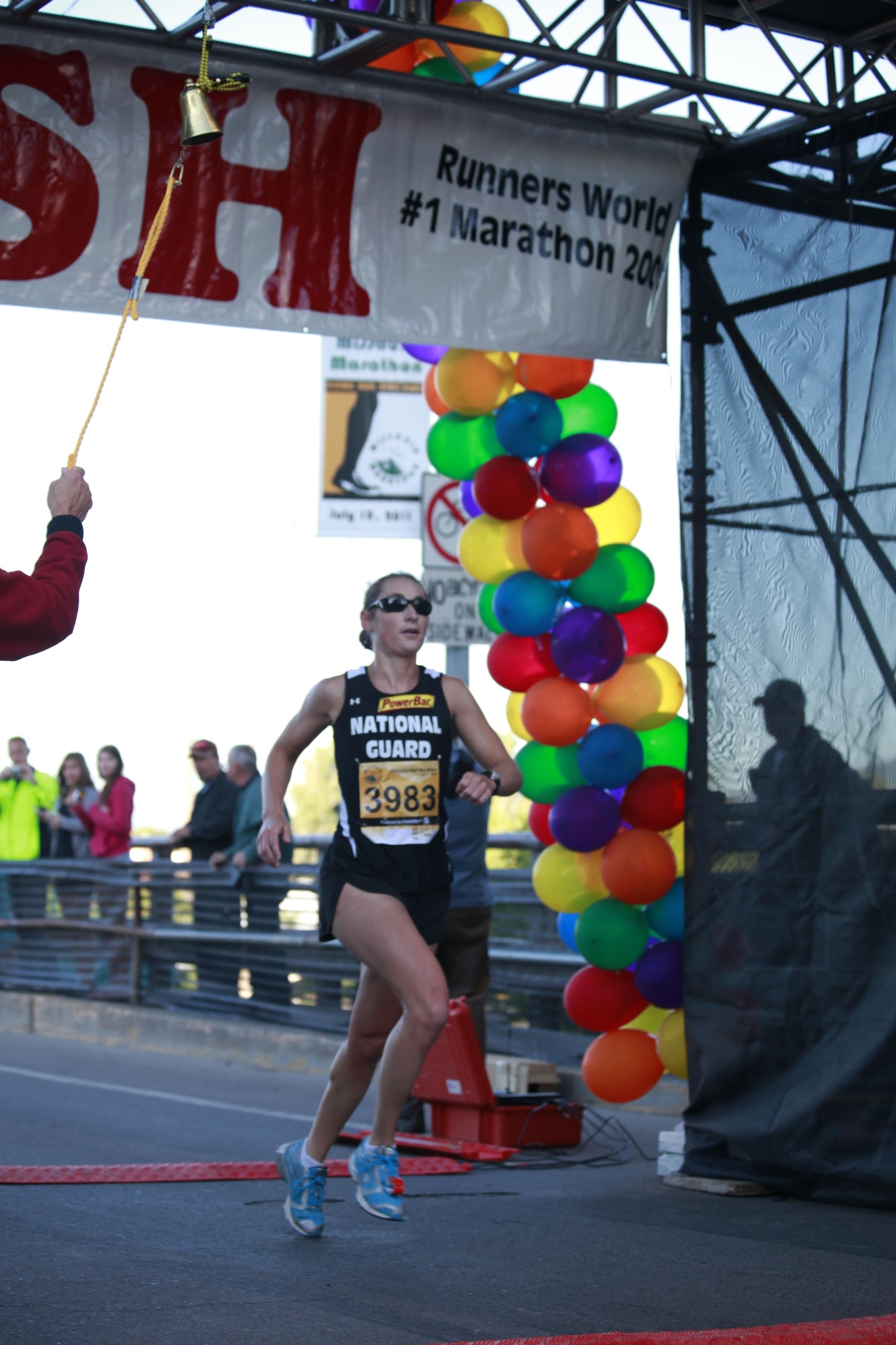 Airman 1st Class Emily J. Shertzer, instrumentalist, 553rd Air Force Band of the Mid-Atlantic, Fort Indiantown Gap, Pa., crosses the finish line of the Missoula Half Marathon on July 10, 2011. The win was one of many 2011 accomplishments that contributed to her being named Air Force 2011 Female Athlete of the Year. (Courtesy photo)