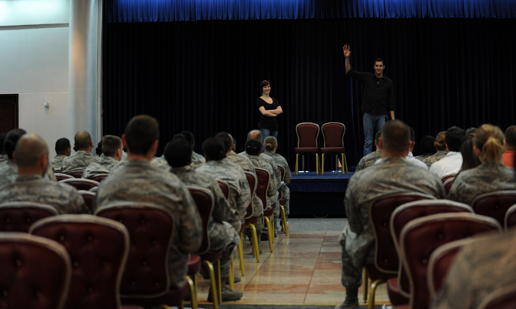 Audience members watch “Sex Signals,'' a two-person improvisational comedy show April 4, 2012, at Incirlik Air Base, Turkey. The show allowed audience participation to depict scenarios involving early warning signs of relationship violence and prevent sexual assault. (U.S. Air Force photo by Senior Airman Jarvie Z. Wallace/Released)