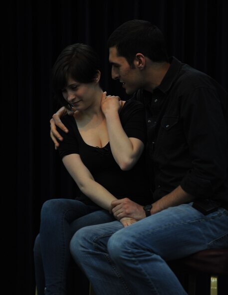 Annie Rix, left, and Chris Beier, Catharsis Productions actors, perform a skit about dating during ''Sex Signals,'' a two-person improvisational comedy show April 4, 2012, at Incirlik Air Base, Turkey. The actors demonstrated how to recognize early warning signs of relationship violence and prevent sexual assault. (U.S. Air Force photo/Senior Airman Jarvie Z. Wallace)(Released)