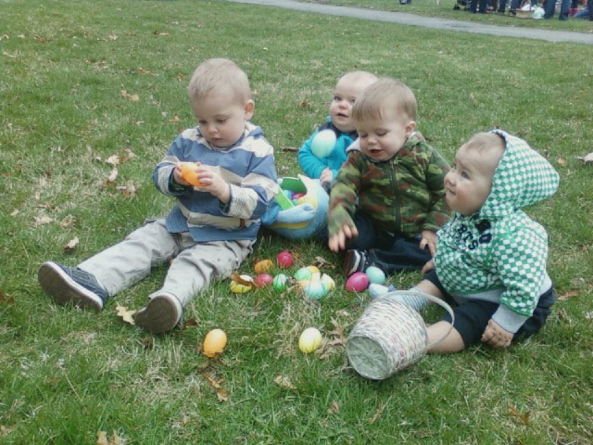 HANSCOM AIR FORCE BASE, Mass. – (from left to right) Trey Madden, Nicholai Raynor, Tucker Bethea and Samuel Gernert gather up their Easter eggs during Spring Fling at the base chapel April 1. The Hanscom community was invited to enjoy an afternoon of crafts, games, scavenger and egg hunts and a visit from the Easter Bunny during this annual event sponsored by the Hanscom Spouses Club and chapel. (Courtesy photo)