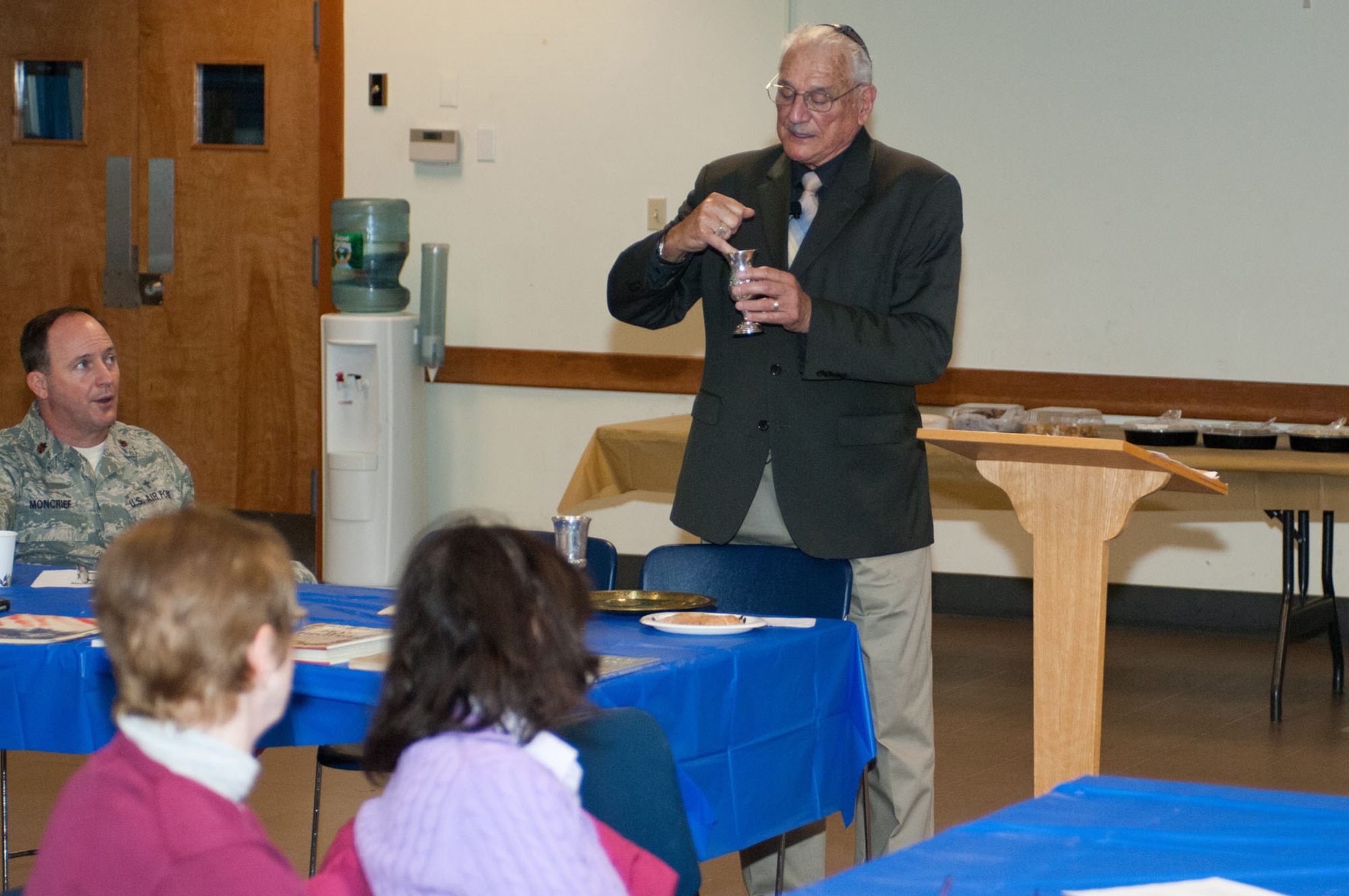 HANSCOM AIR FORCE BASE, Mass. – Rabbi Abraham Morhaim explains the meaning and purpose of the Passover Seder during the Passover Luncheon held at the base chapel March 28. The event, sponsored by the  Hanscom Jewish Group, invited members from the base community to learn about Passover and enjoy an Israeli-style lunch. (U.S. Air Force photo by Rick Berry)
