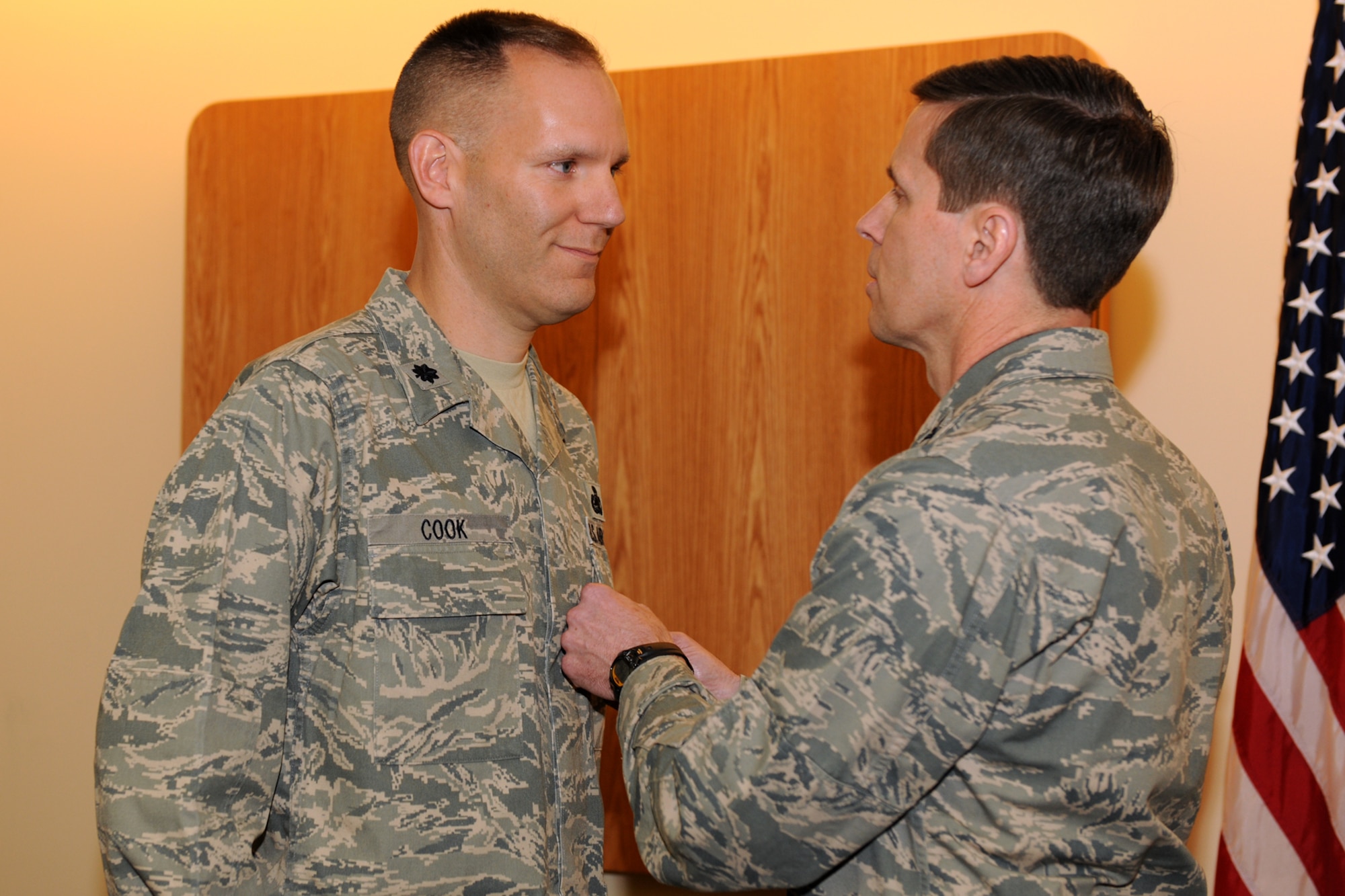 Lt. Col. Edward Cook (left), Commander, 174th Fighter Wing Logistics Readiness Squadron, is presented the Bronze Star medal by 174th Fighter Wing Commander Col. Greg Semmel, during a ceremony held on 31 March 2012 at Hancock Field Air National Guard Base, Syracuse, NY.  Cook received the Bronze Star for exceptionally meritorious service as the Director of Joint Logistics, Combined Forces Special Operations Component Command, while deployed to Afghanistan from August 2011-Feb 2012. (NY Air National Guard Photo by: Staff Sgt. James N. Faso II, Released)