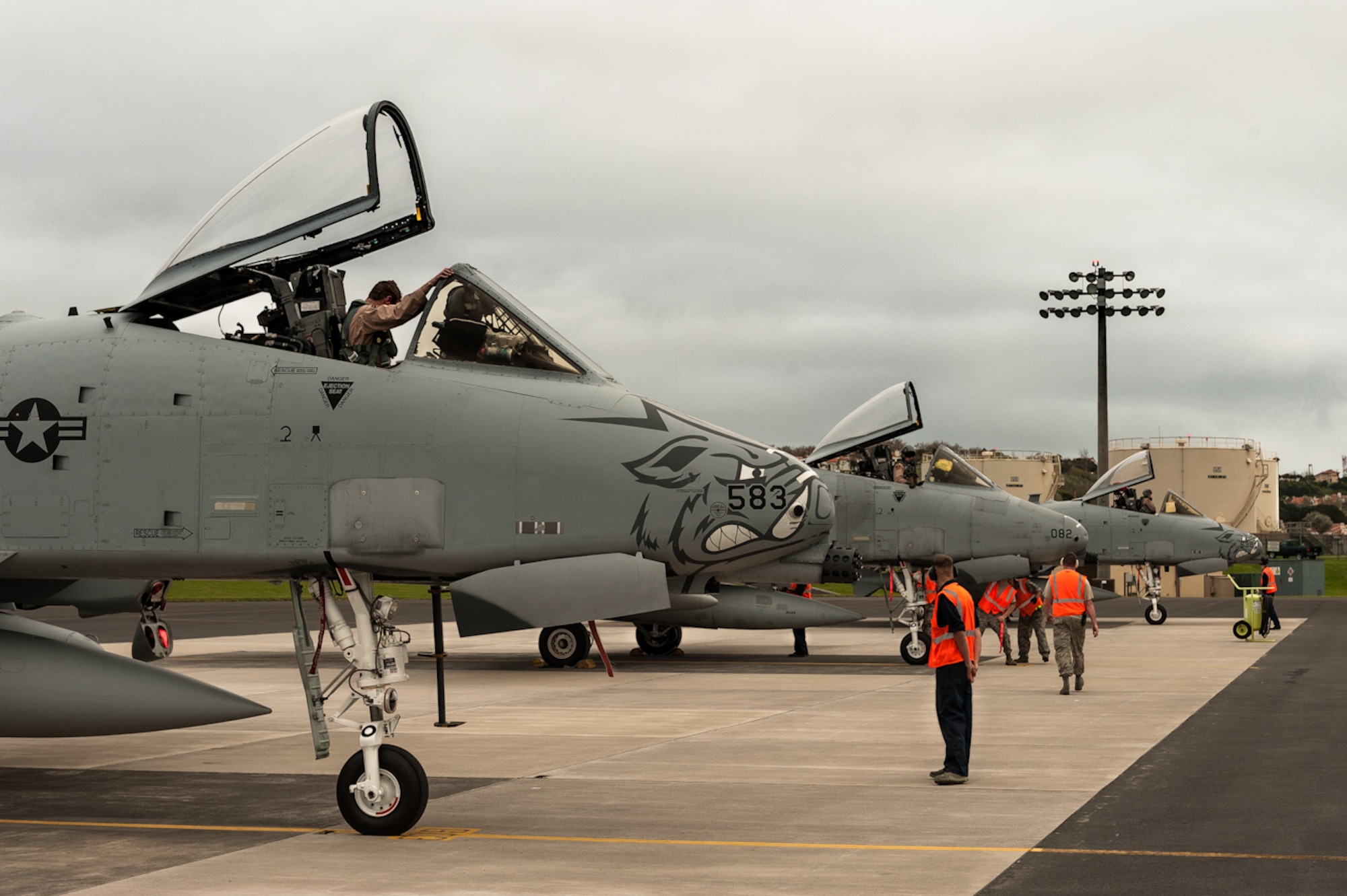 Transient alert members from the 65th Operations Support Squadron park incoming A-10C Thunderbolts. Eighteen A-10s from the 175th Warfield Air National Guard Base landed at Lajes Field March 31, making it the largest A-10 coronet to fly to Lajes Field this year. (U.S. Air Force photo/Lucas Silva)