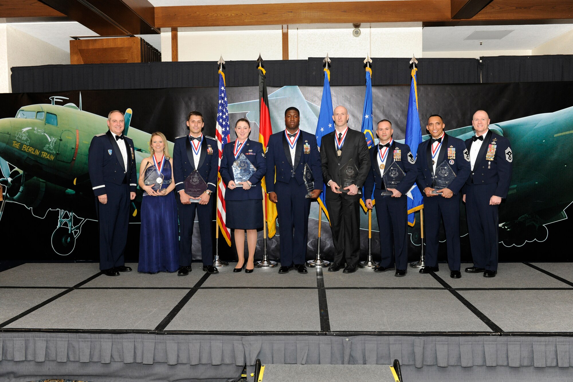 (Left) Gen. Mark Welsh III, U.S. Air Forces in Europe commander and USAFE
Command Chief Master Sgt. David Williamson stand with the seven outstanding
USAFE Airmen at Ramstein Air Base, Germany, March 30, 2012. From left to
right they winners are: Patricia Gill, Civilian Category I, 65th Air Base
Wing, Lajes Field, Azores; Capt. Anthony Behney, Company Grade Officer, 31st
Fighter Wing, Aviano Air Base, Italy; Senior Airman Anna Maria Al Dabbagh,
Airman Category, 31st Fighter Wing, Aviano Air Base, Italy; Tech. Sgt.
Robert M. Graves, NCO Category, 86th Airlift Wing, Ramstein Air Base,
Germany; Adam Ross, Civilian Category II, 435th Air Ground Operations Wing,
Ramstein Air Base; Senior Master Sgt. Emilio Hernandez, Senior NCO Category,
100th Air Refueling Wing, Royal Air Force Mildenhall, United Kingdom; Senior
Master Sgt. Manny Pineiro, First Sergeant Category, 3rd Air Force, Ramstein
AB. (U.S. Air Force photo by Staff Sgt. Christopher Willis/Released)
