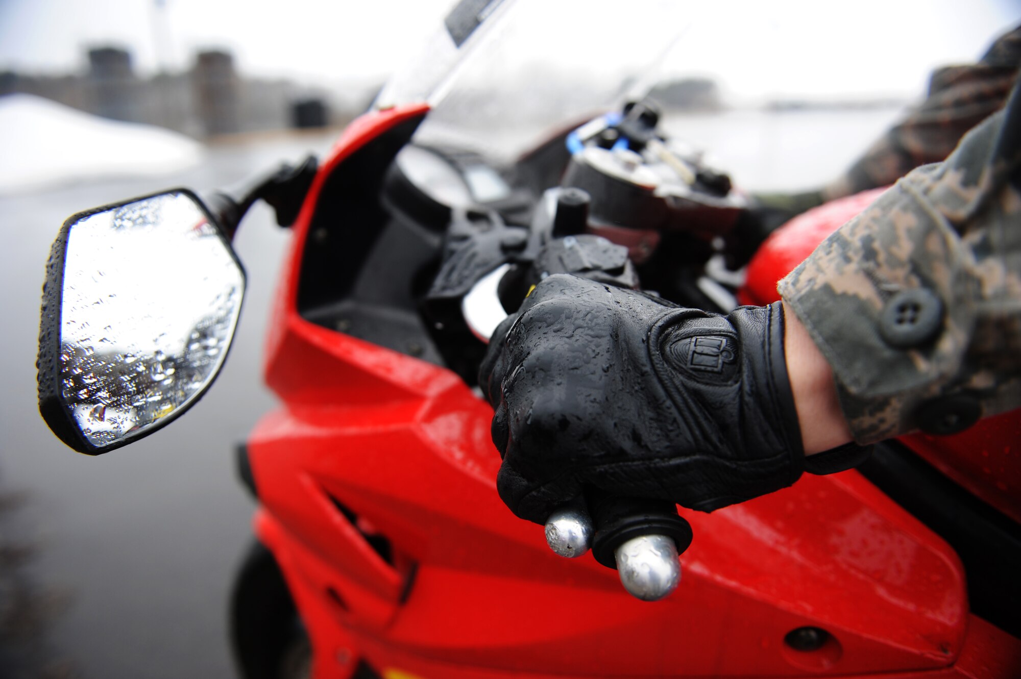 U.S. Air Force Airman 1st Class Matthew Aikens, 35th Maintenance Squadron precision guided munitions crew member, maintains control of his motorcycle at Misawa Air Base, Japan, April 3, 2012. Motorcycle season at Misawa began on April 3 with a mandatory motorcycle rider all-call safety briefing. (U.S. Air Force photo by Airman 1st Class Kia Atkins/Released)