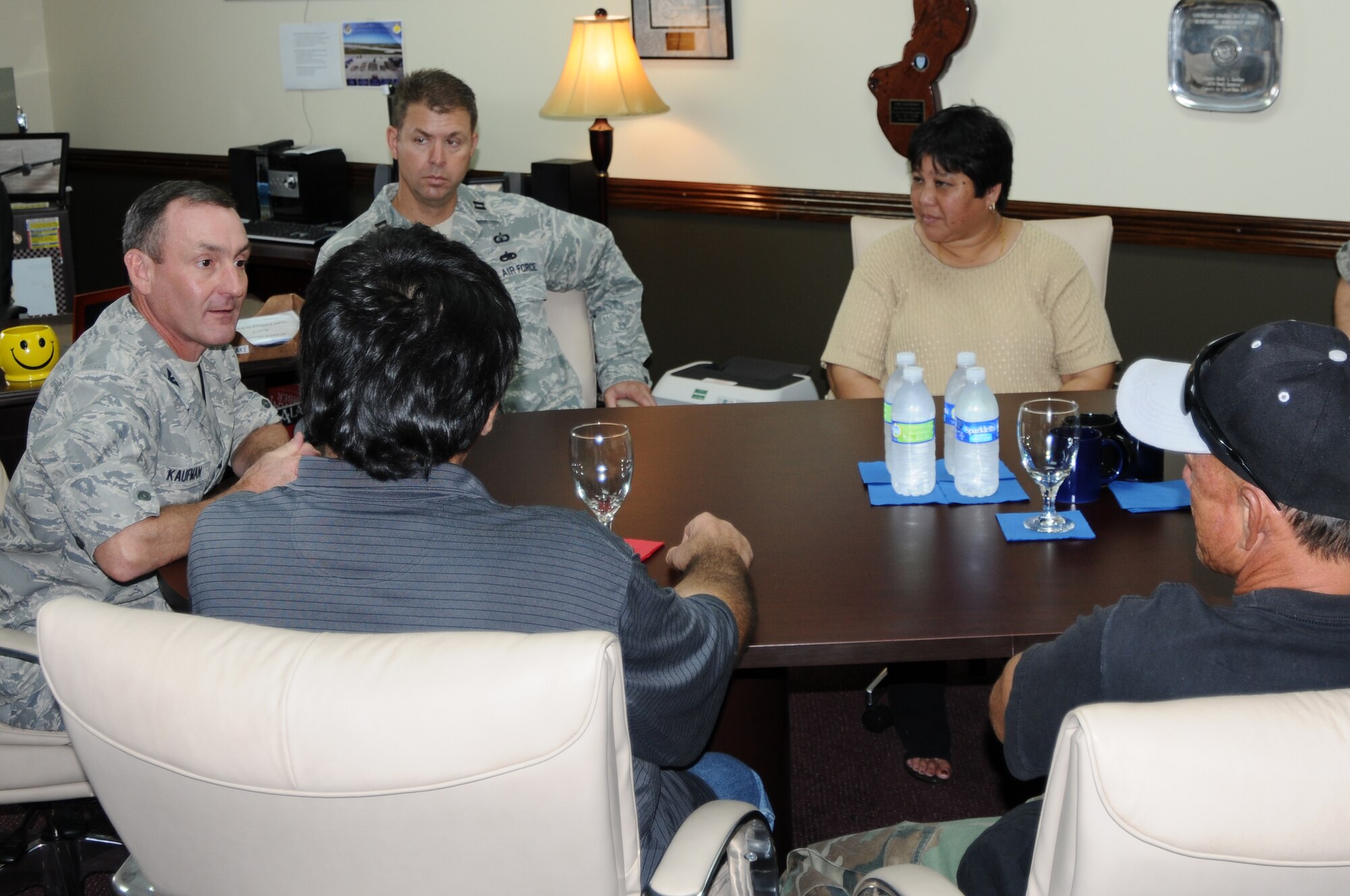 ANDERSEN AIR FORCE BASE, Guam- The mayor and vice mayors from Dededo and
Yigo visit with Col. Randy Kaufman, 36th Operations Group Commander (Left)
and Capt. Anthony Hayes, 36th Operations Support Squadron Airfield
Operations flight commander (top left) during a visit April 3. The mayor
from Dededo and vice mayors from Dededo and Yigo visited Team Andersen to
discuss flight operations with senior officials and to discuss more ways the
base and community could continue to work together. (U.S. Air Force
photo/Senior Airman Carlin Leslie)
