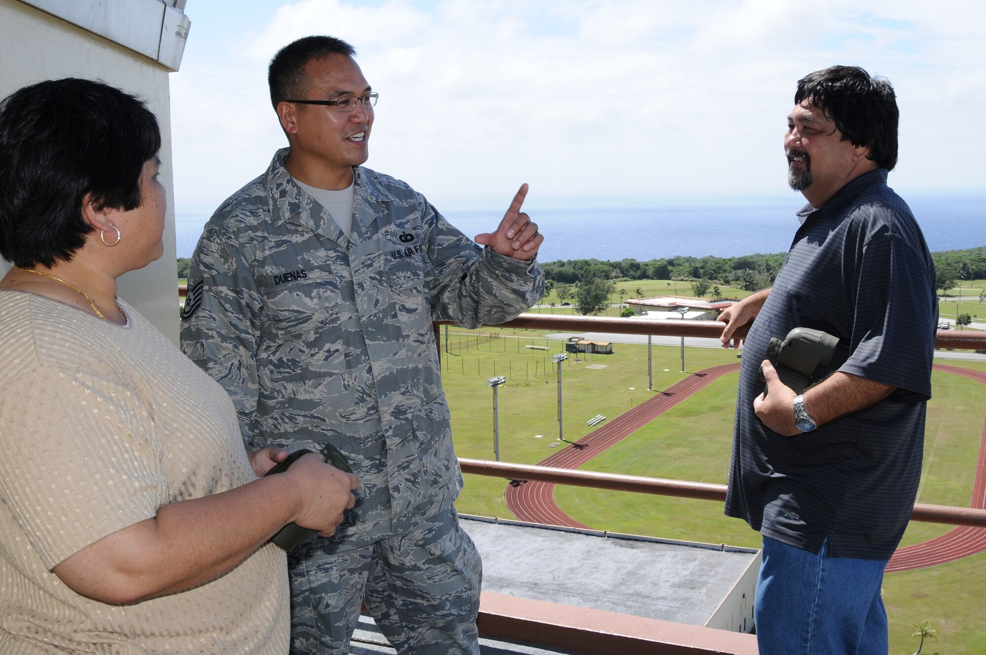 ANDERSEN AIR FORCE BASE, Guam- Honorable Melissa B. Savares, Mayor of
Dededo, Guam (left) and Honorable Ronald "Ron" J. Flores (right) Vice Mayor
of Yigo, Guam, speak with Tech. Sgt. Julian Duenas, 36th Operations Support
Squadron tower watch supervisor, about flight patterns around Andersen April
3. The mayor from Dededo and vice mayors from Dededo and Yigo visited Team
Andersen to discuss flight operations with senior officials and to discuss
more ways the base and community could continue to work together. (U.S. Air
Force photo/Senior Airman Carlin Leslie) 
