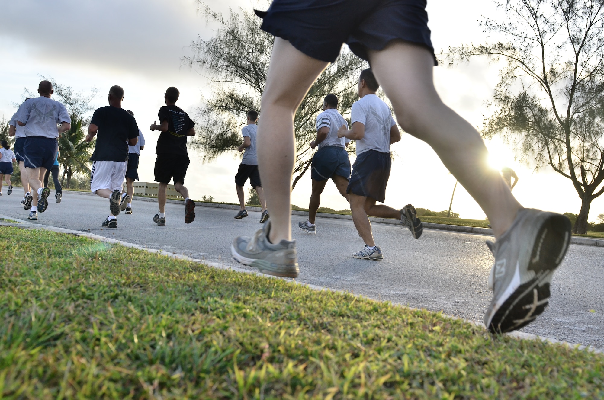 ANDERSEN AIR FORCE BASE, Guam--Andersen Airmen and Navy Seamen participate in the Sexual Assault Awareness Month 5K April 4. The run was one of many events scheduled by the area SARCs to raise awareness throughout the month. This April, the 2012 Sexual Assault Awareness Month campaign centers on promoting healthy sexuality to prevent sexual violence. (U.S. Air Force Photo by Staff Sgt. Alexandre Montes/ RELEASED) 