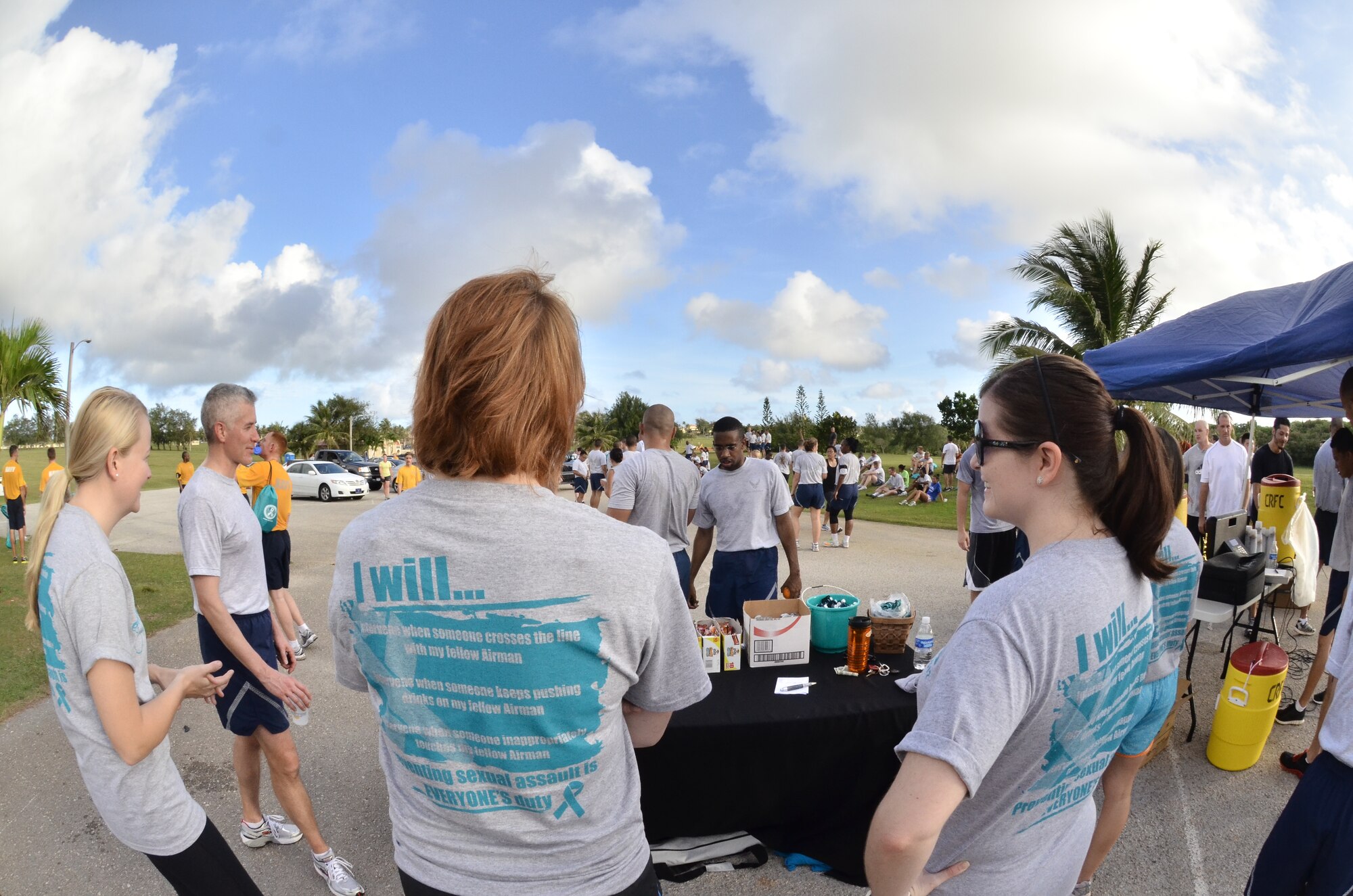 ANDERSEN AIR FORCE BASE, Guam—Several 36th Wing Sexual Assault Response Coordinators provide healthy snacks and memorabilia after the Sexual Assault Awareness Month 5K here April 4. The run was one of many events scheduled by the area SARCs to raise awareness throughout the month. This April, the 2012 Sexual Assault Awareness Month campaign centers on promoting healthy sexuality to prevent sexual violence. (U.S. Air Force Photo by Staff Sgt. Alexandre Montes/ RELEASED) 