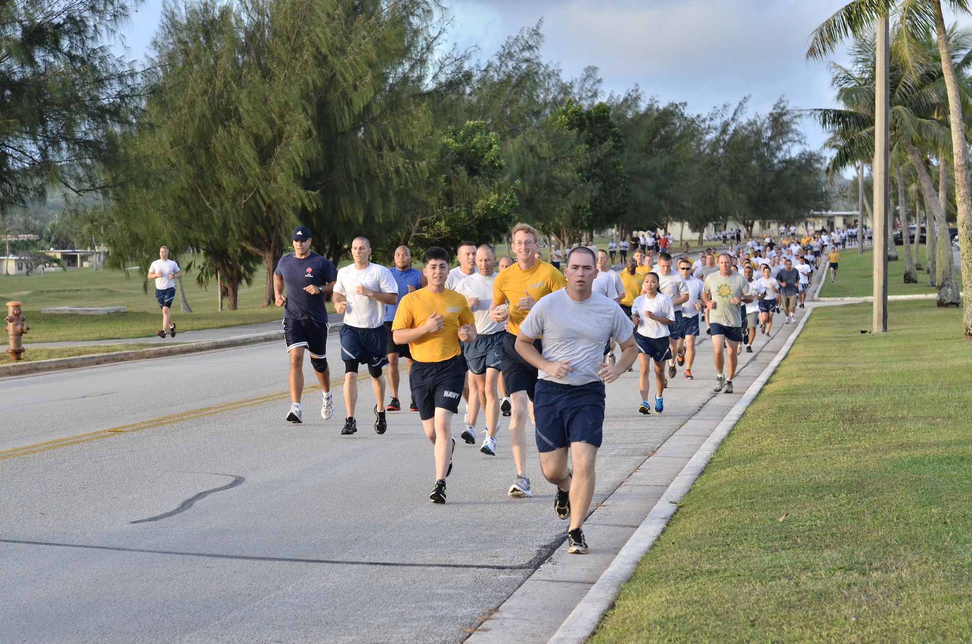 ANDERSEN AIR FORCE BASE, Guam--Andersen Airmen and Navy Seamen participate in the Sexual Assault Awareness Month 5K April 4. The run was one of many events scheduled by the area SARCs to raise awareness throughout the month. This April, the 2012 Sexual Assault Awareness Month campaign centers on promoting healthy sexuality to prevent sexual violence. (U.S. Air Force Photo by Staff Sgt. Alexandre Montes/ RELEASED) 