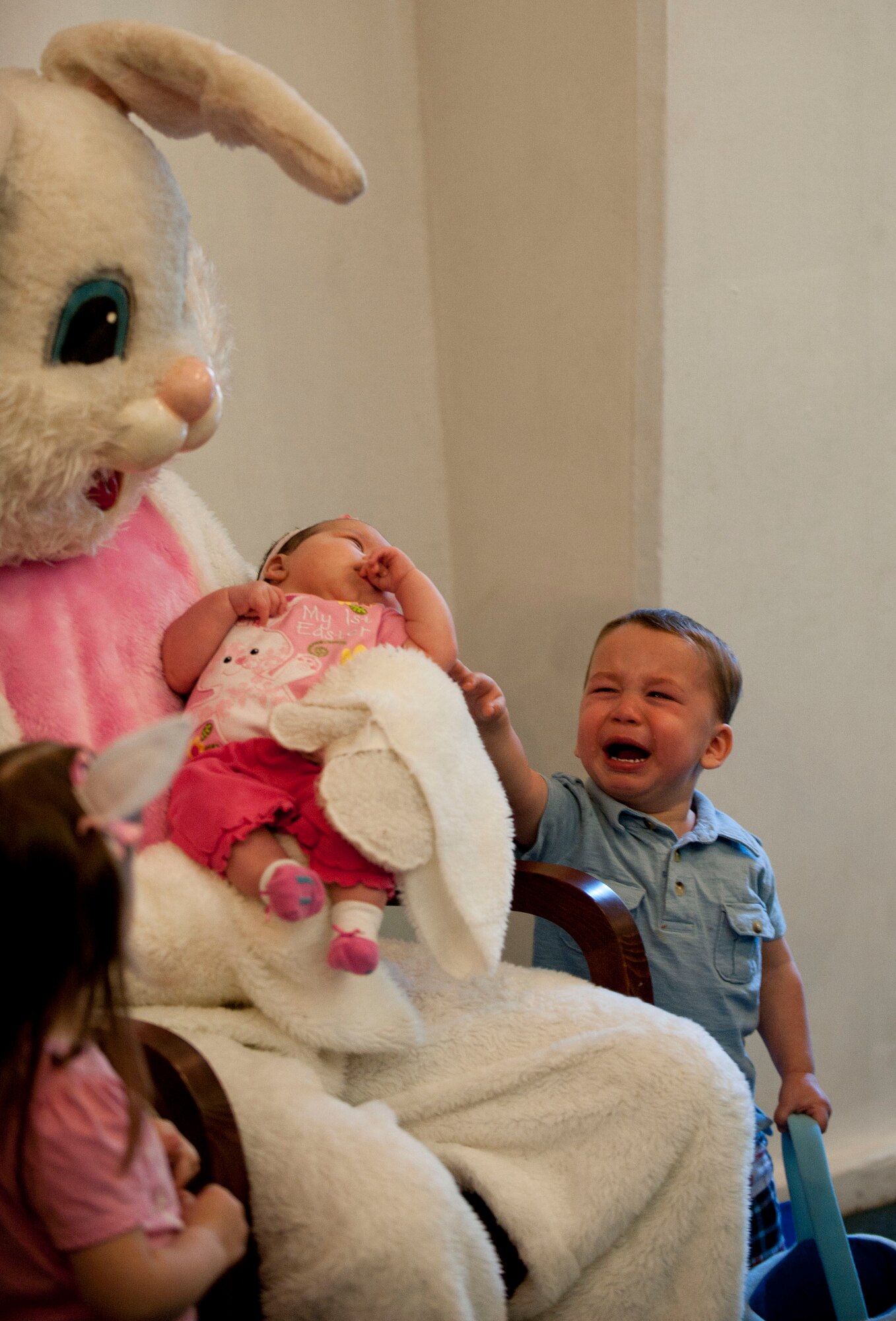 Children pose for a photo with the Easter bunny at the Easter Bunny Kids at Play event April 4, 2012, at Incirlik Air Base, Turkey. The event was hosted by the 39th Force Support Squadron and included various arts and crafts, games, and an egg hunt. (U.S. Air Force photo by Senior Airman Clayton Lenhardt/Released)