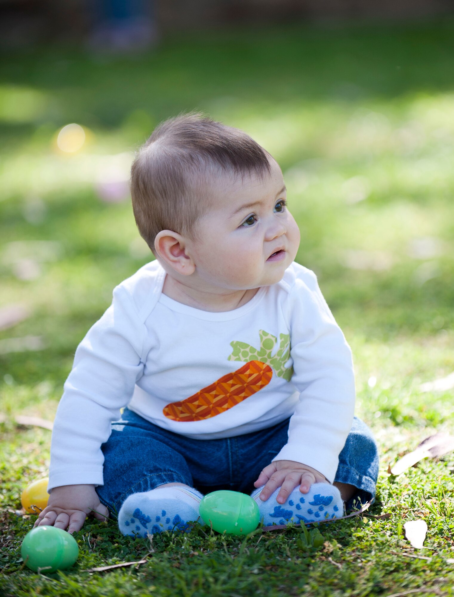 A child collects eggs at the Easter Bunny Kids at Play event April 4, 2012, at Incirlik Air Base, Turkey. The event was hosted by the 39th Force Support Squadron and included arts and crafts, games, and a chance to take photos with the Easter bunny. (U.S. Air Force photo by Senior Airman Clayton Lenhardt/Released)