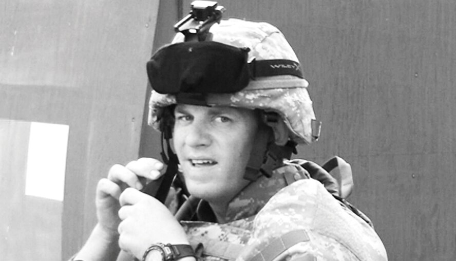 Staff Sgt. Travis Griffin prepares for a patrol during his final deployment from 2007 to 2008 with the 732nd Expeditionary Security Forces Squadron in Baghdad, Iraq.