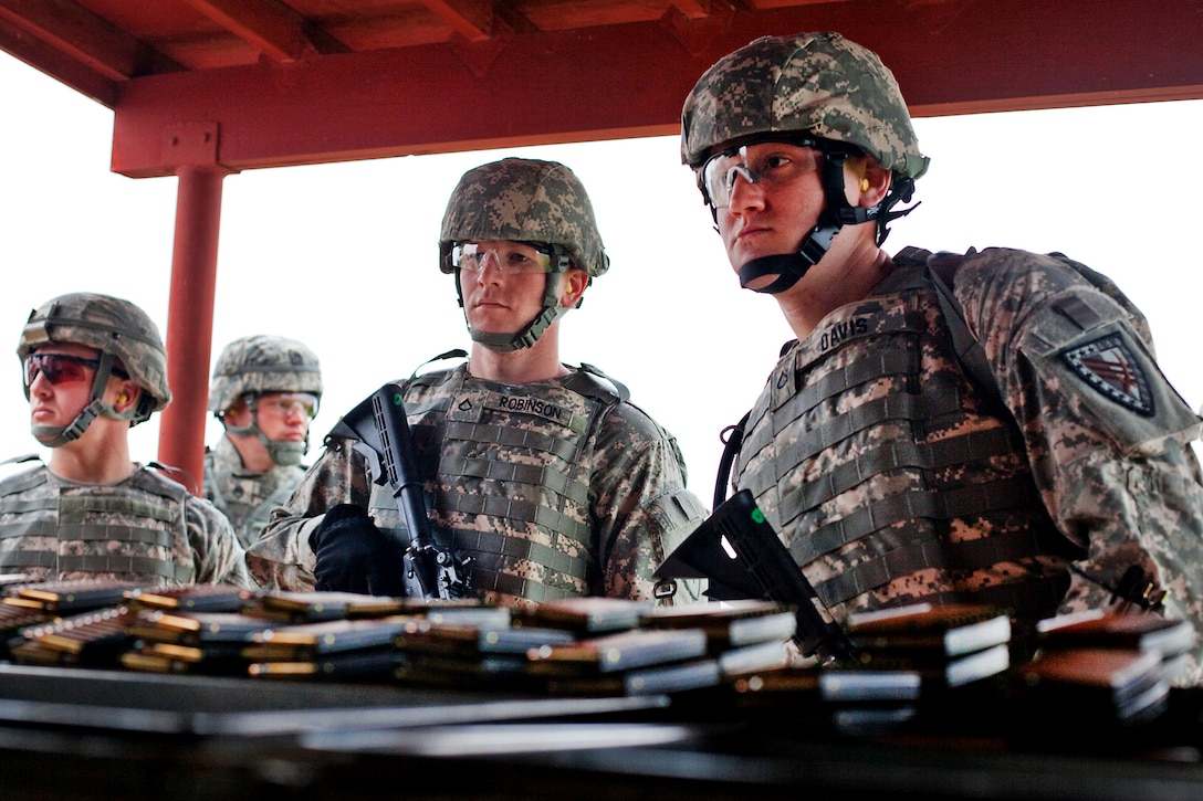 Army Pfc. Matt Davis, Right, Pfc. Matt Robinson, Center, And Spc ...