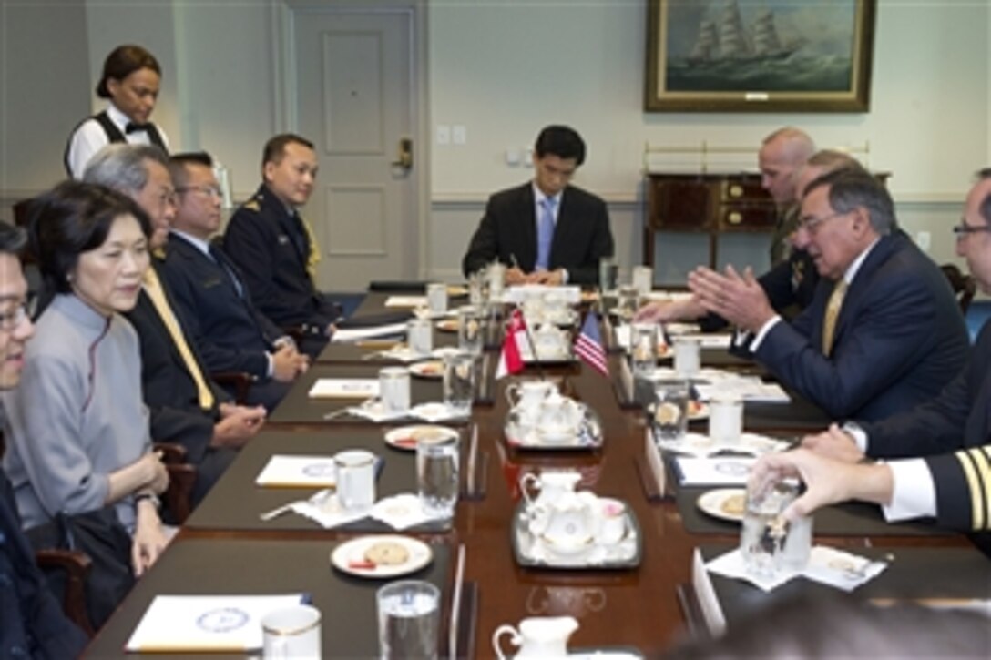 Secretary of Defense Leon E. Panetta meets with Defense Minister of Singapore Ng Eng Hen in the Pentagon on April 4, 2012.  
