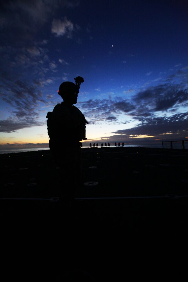 Martin Durette, the head of support branch with Fleet Support Division aboard Marine Corps Logistics Base Barstow, answers his phone, Apr. 5, 2012. Durette is a retired Marine Corps master sergeant who also teaches the CCLD program, promoting healthy working relationships between Marines and civilians working for FSD.
