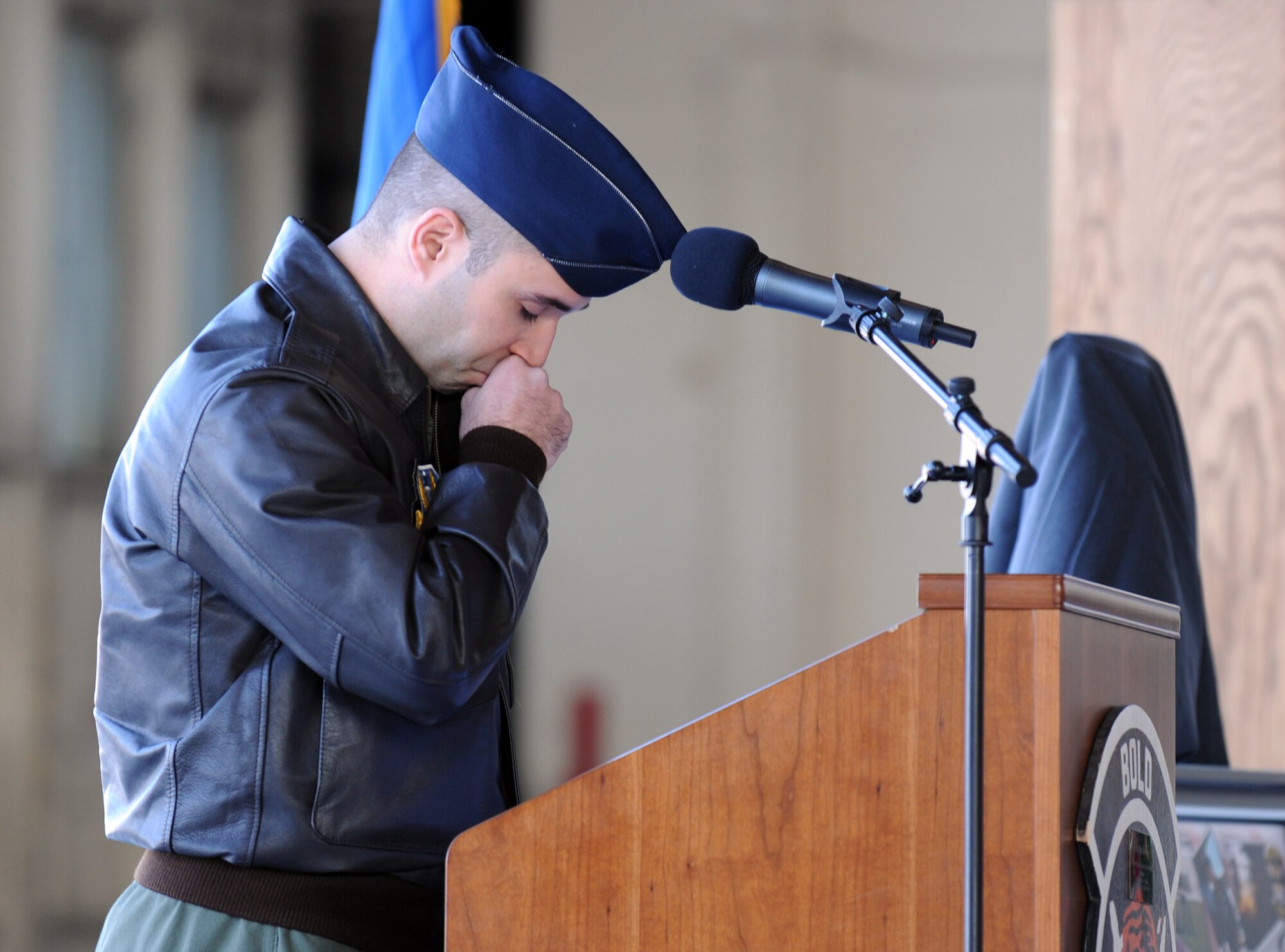 U.S. Air Force Capt. Justin Warner, 391st Fighter Squadron, reads the obituary for Capt. Dee “Piston” Imlay during his memorial service April 6, 2012, at Mountain Home Air Force Base, Idaho.  Warner, who considered Imlay to be one of his closest friends, also worked side-by-side with him during his time at MHAFB. (U.S. Air Force photo/Senior Airman Debbie Lockhart)