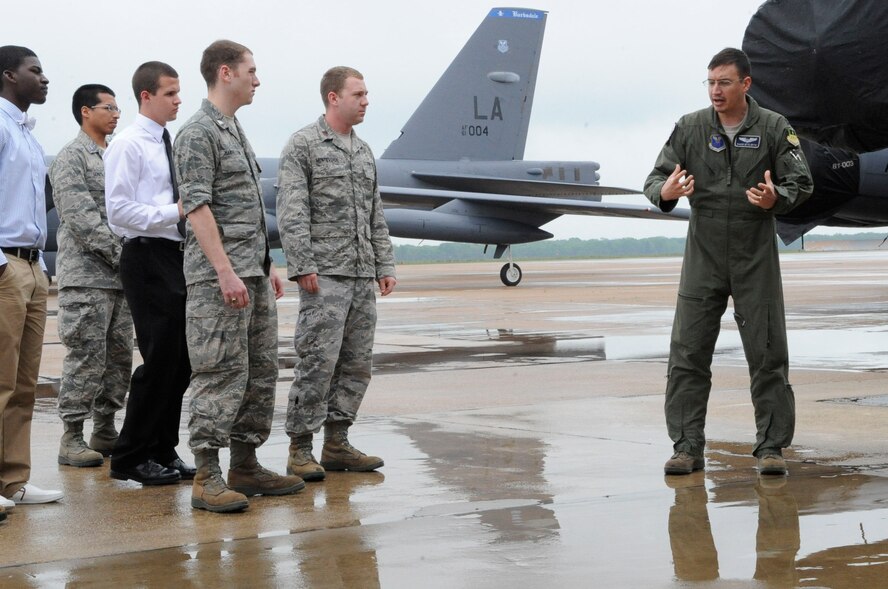 Air Force Reserve Officers' Training Corps cadets from Tulane University and Louisiana Tech University tour a B-52H Stratofortress on the flightline during their visit to Barksdale Air Force Base, La., March 30. Capt. David McClintic, 20th Bomb Squadron electronic warfare officer, taught the cadets about the schooling requirements and expectations of officers who fly. (U.S. Air Force photo/Airman 1st Class Andrea F. Liechti) (RELEASED)
