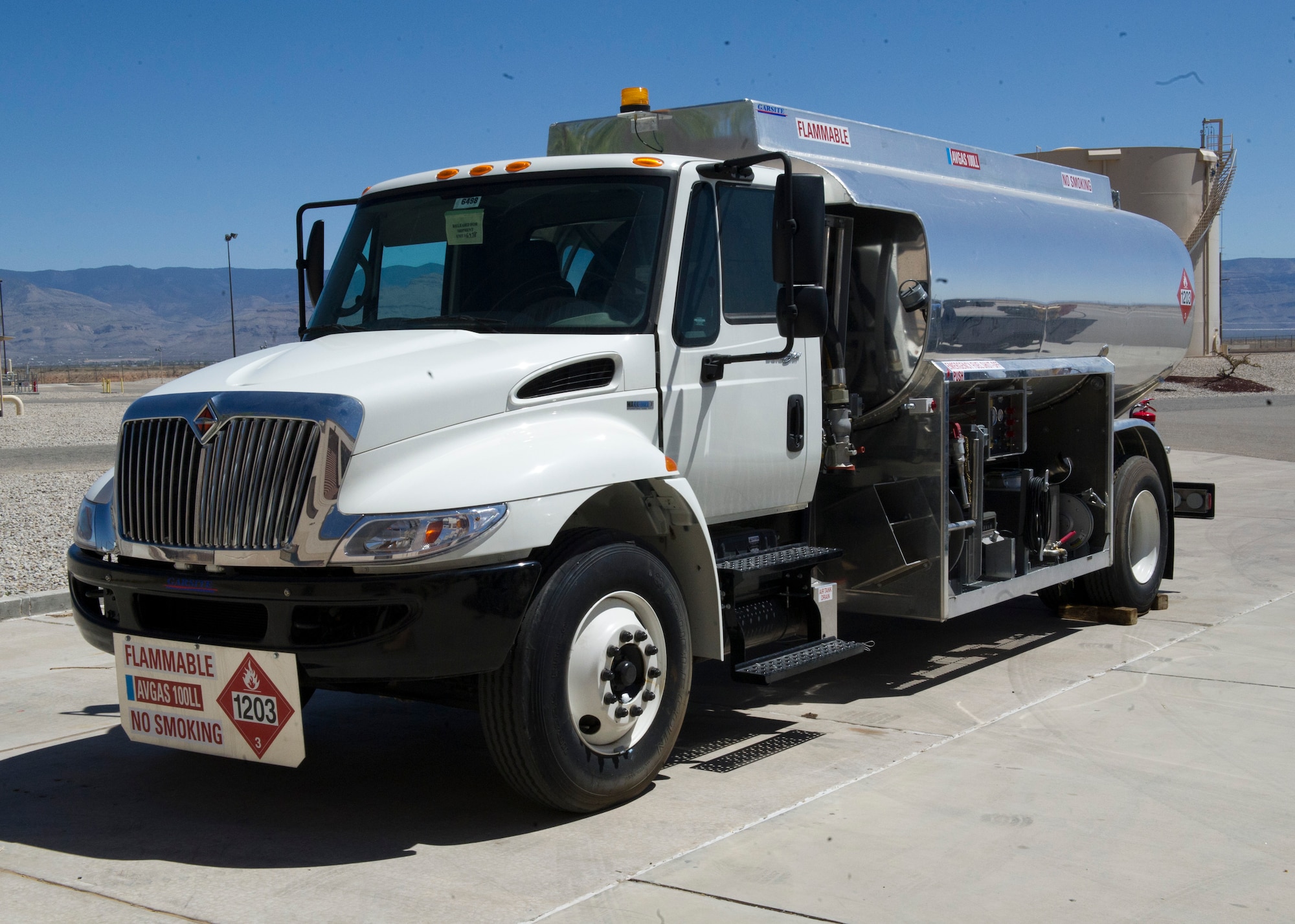 HOLLOMAN AIR FORCE BASE, N.M. – An AVGAS truck sits in the 49th Logistics Readiness Squadron Fuels Management Flight’s parking lot April 5. AVGAS, or aviation gasoline, is what fuels the MQ-1 Predator. Holloman has two AVGAS trucks that are the first AVGAS-specific trucks in Air Combat Command’s inventory. The two trucks will save 1,500 work hours per year and $6,000 per month. (U.S. Air Force photo by U.S. Air Force Airman 1st Class Siuta B. Ika/ Released)