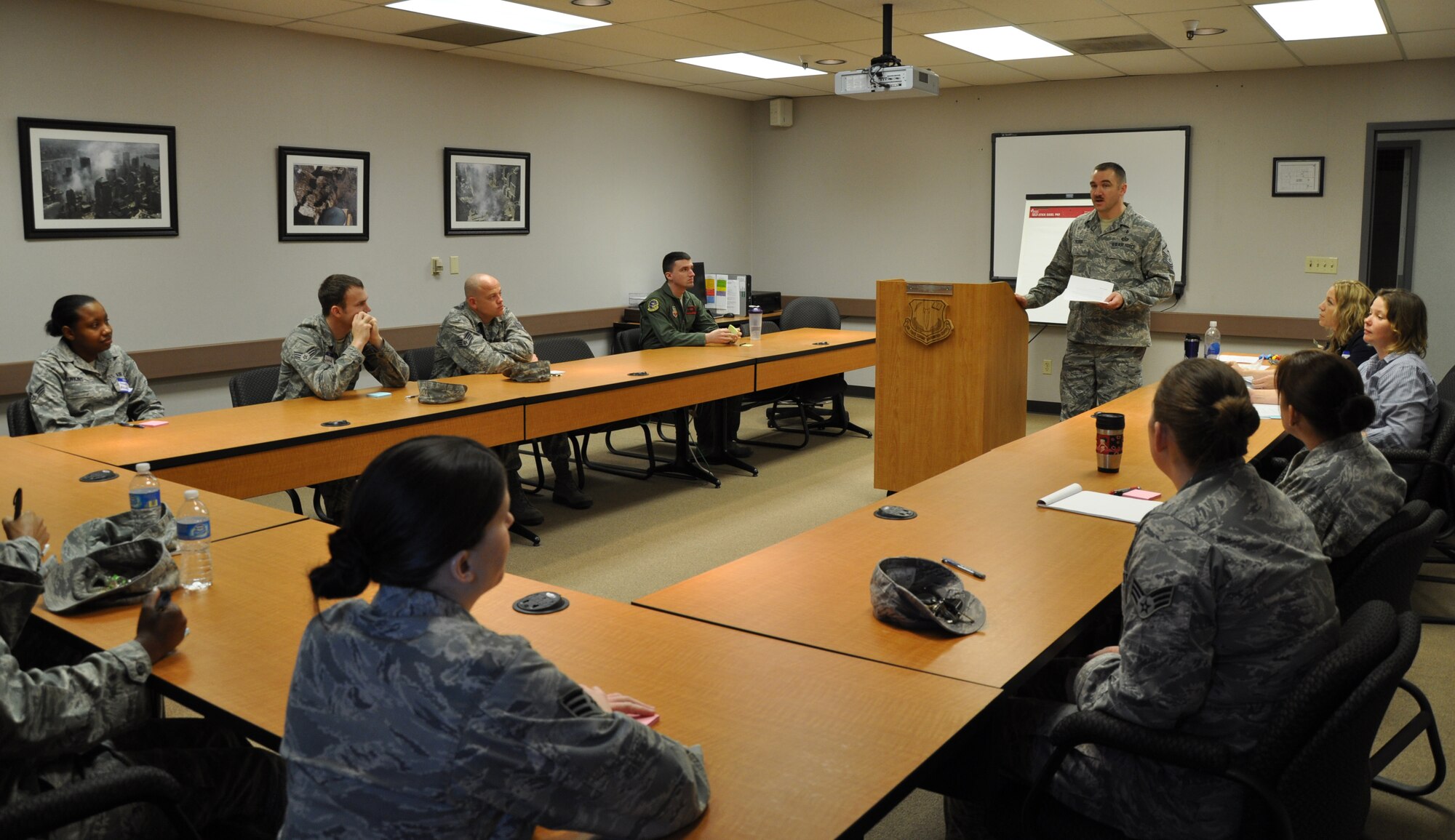 Master Sgt. Andrew Flora, 9th Munitions Squadron, first sergeant explains the guidelines for the Caring For People Forum at Beale Air Force Base, Calif., March 30, 2012. Members of Team Beale were invited to the forum to address Beale and Air Force concerns. (U.S. Air Force photo by Staff Sgt. Robert M. Trujillo/Released) 