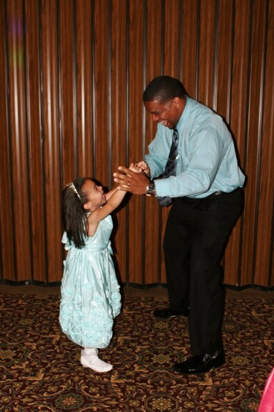 Danica and Shane Stovall have fun dancing during the Daddy-Daughter Dance at AEDC. (Photos by Andrea Stephens)
