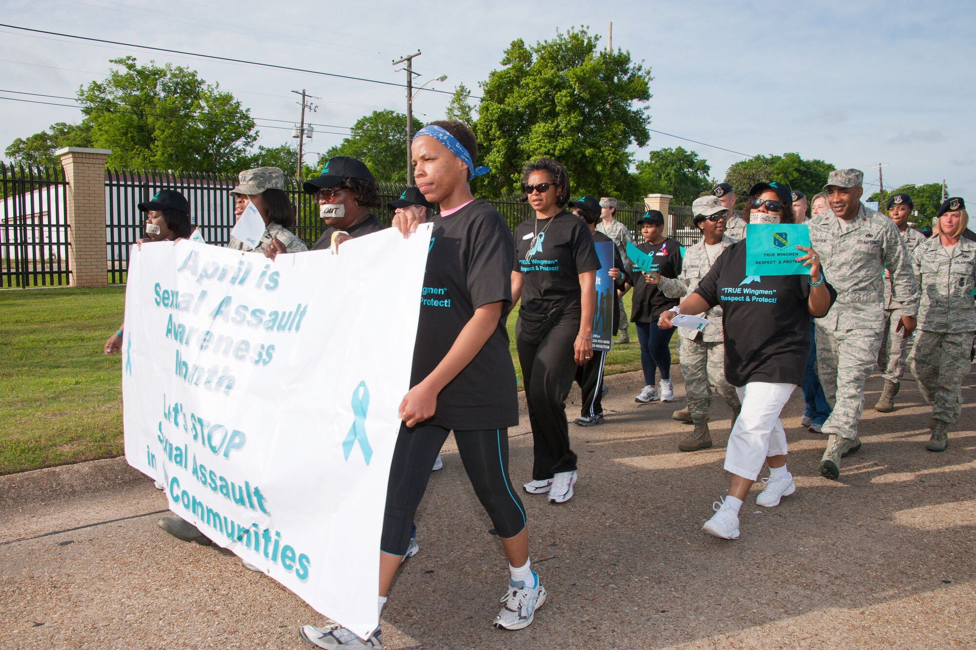 Airmen and civilians, men and women, walk together through Maxwell
Wednesday in support of sexual assault awareness. (Air Force photo by Melanie Rodgers Cox)