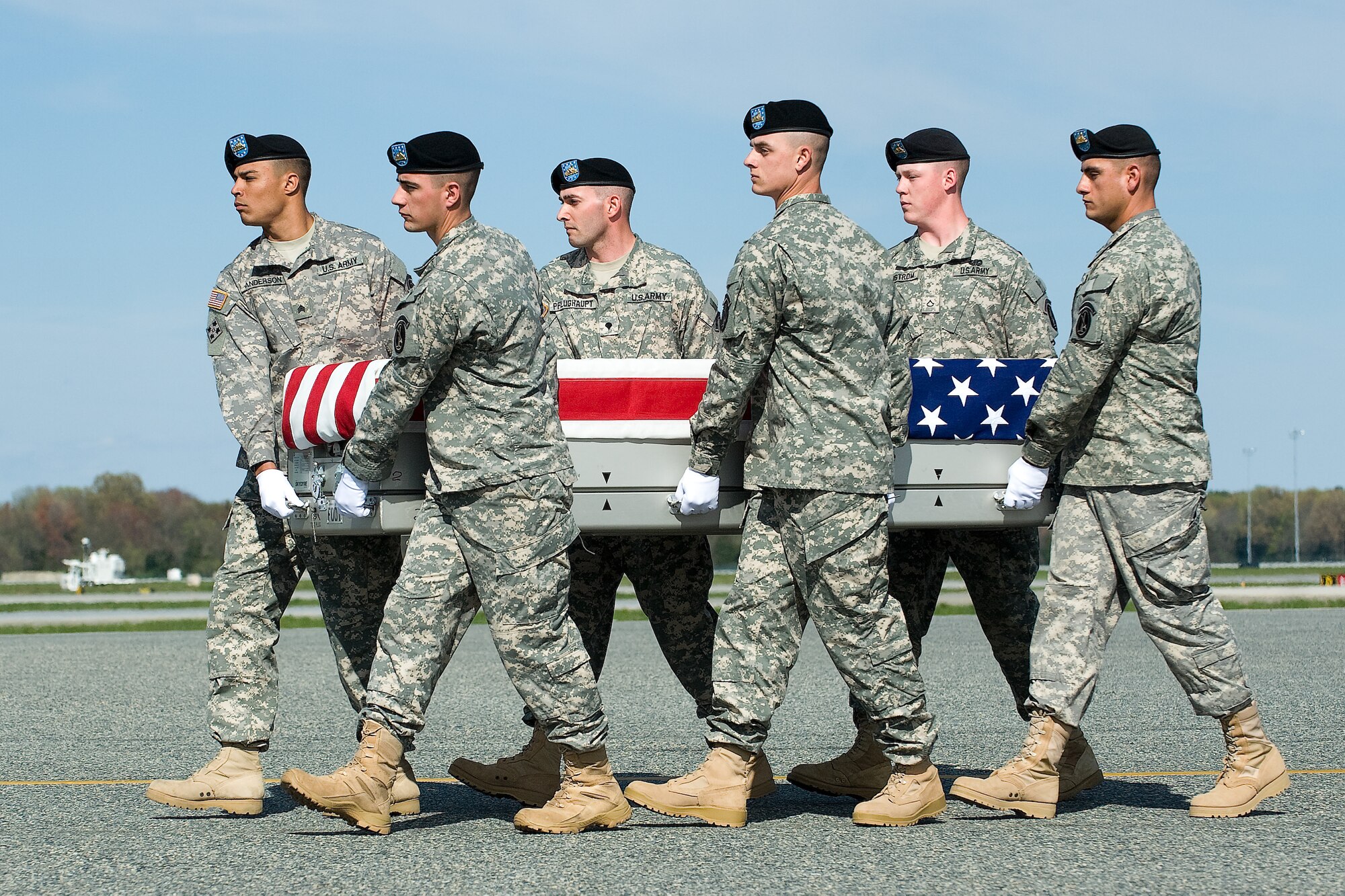 A U.S. Army carry team transfers the remains of Army Spc. Jeffrey L. White Jr. of Catawissa, Mo., at Dover Air Force Base, Del., April 5, 2012. White was assigned to the 1st Battalion (Airborne), 501st Infantry Regiment, 4th Brigade Combat Team (Airborne), 25th Infantry Division, Joint Base Elmendorf-Richardson, Ala. (U.S. Air Force photo/Steve Kotecki)
