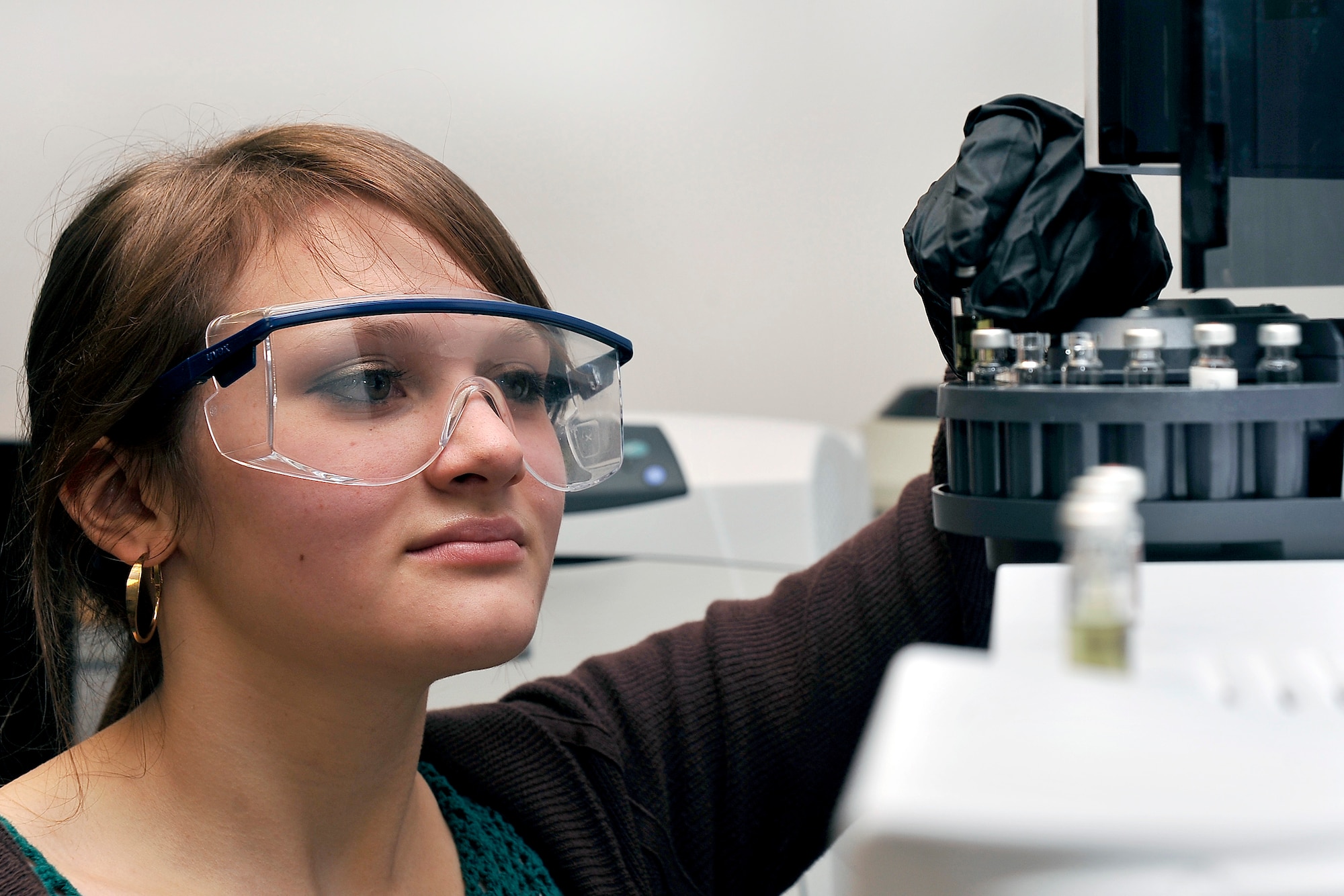 Sara Volz, 16, conducts research in the Life Sciences Research Center at the Air Force Academy Feb. 14, 2012. Volz's research centers on exploring the use of algae as biofuel. She is a junior at Cheyenne Mountain High School in Colorado Springs, Colo. (U.S. Air Force photo/Elizabeth Andrews)