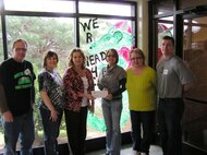 Christy Brunner, education chairman of the ATA Employee and Community Activities Committee recently presented a check to math and science teachers at North Middle School in Franklin County.  The money will be used for materials needed to build robotic arms and educational aids to increase skills in algebra, geometry and measurement.  Pictured from left to right are James Murphy, Anita Krause, Jackie Puryear, Christy Brunner, Ellen Jackson and T.J. Christian. (Photo provided)