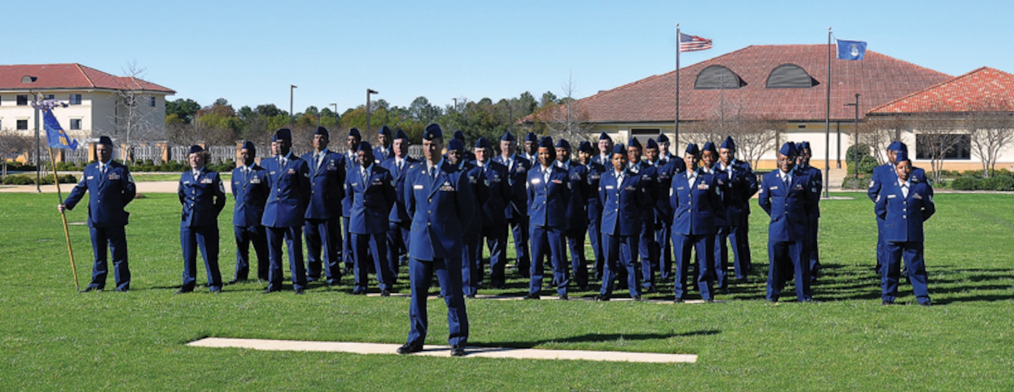 Members of the newly formed 908th Force Support Squadron stand at ease during the assumption of command ceremony. (Air Force photo by Gene H. Hughes)