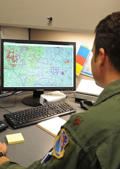 DYESS AIR FORCE BASE, TEXAS - Maj. Jeff Moffitt, 337th Test and Evaluation Squadron, works on the newest B-1 bomber mission planning software March 29. The Electronic Systems Center recently completed an early fielding of the B-1 Mission Planning Release 6.0  which  provides new features and capabilities. (U.S. Air Force photo by Airman 1st Class Peter Thompson/Released)