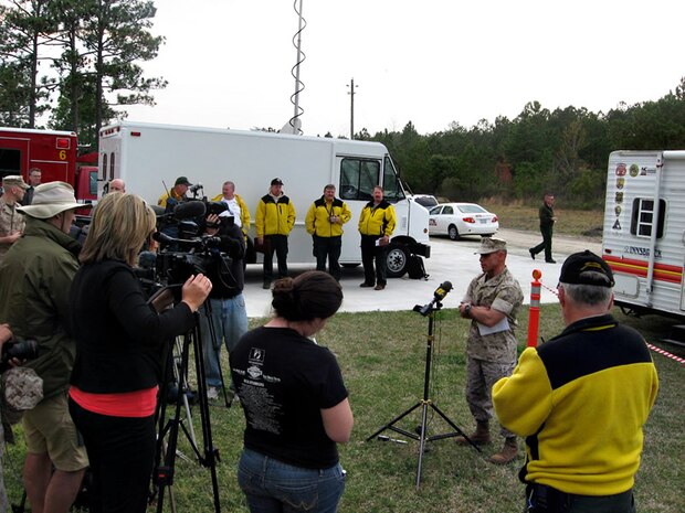 MARINE CORPS BASE CAMP LEJEUNE, N.C. - Crews from the Camp Lejeune Fire Department and the North Carolina State Forestry Service worked to contain two wildfires all within the Greater Sandy Run Area in March 2011.  Colonel Daniel J. Lecce conducted a press conference to provide an update on the containment progress for the fire.