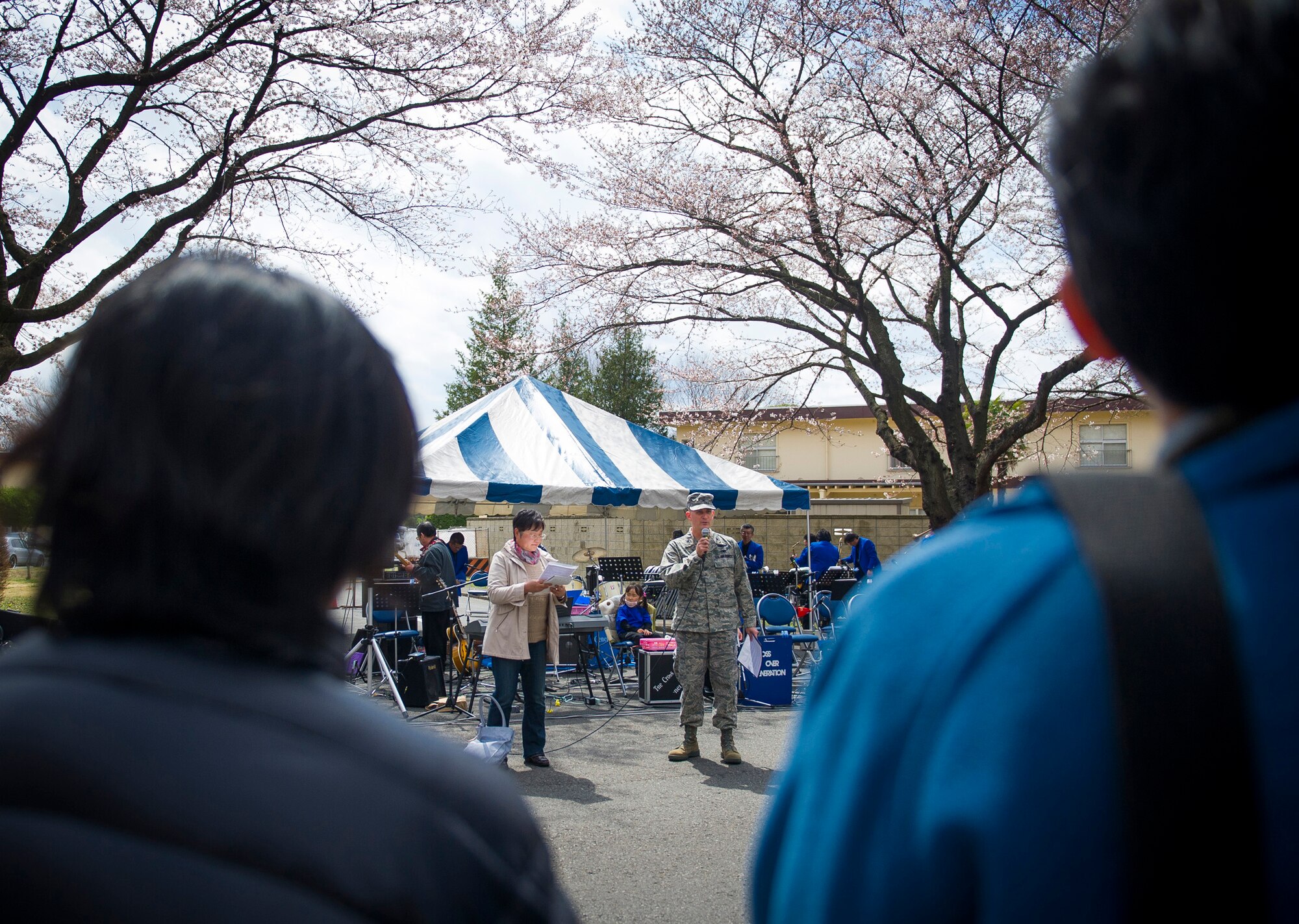 YOKOTA AIR BASE, Japan -- Col Bill Knight, 374th Airlift Wing commander, gives the opening remarks during the Sakura Walk April 7, 2012, Yokota Air Base, Japan. Yokota officials opened the eastern gate of the base to allow local community members to view the cherry blossom trees along McGuire Avenue. (U.S. Air Force photo/Staff Sgt. Chad C. Strohmeyer)