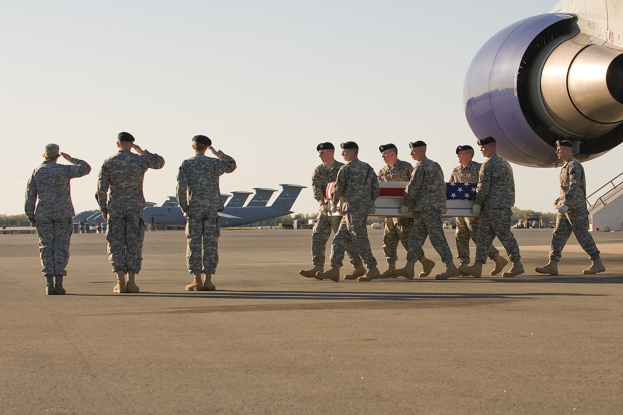 A U.S. Army carry team transfers the remains of Army  Staff Sgt. Tyler J. Smith, of Licking, Mo., at Dover Air Force Base, Del., April 7, 2012. Smith was assigned to the 2nd Battalion, 508th Parachute Infantry Regiment, 4th Brigade Combat Team, 82nd Airborne Division, Fort Bragg, N.C. (U.S. Air Force photo/Steve Kotecki)
