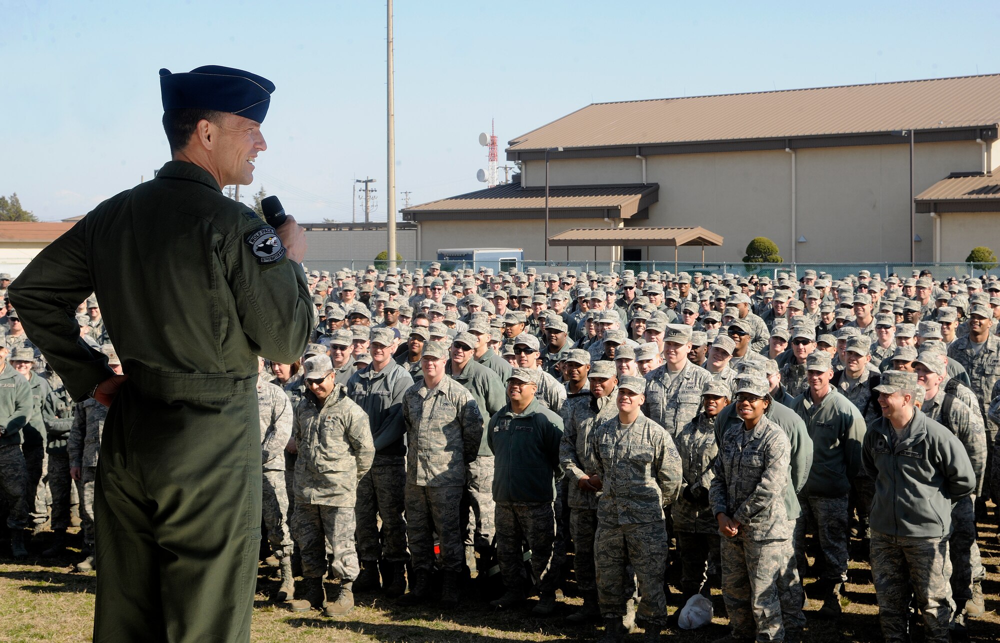 Col. Scott L. Pleus, 8th Fighter Wing commander, talks with Wolf Pack Airmen during an outside Wolf Call, April 6, 2012, on Kunsan Air Base, Republic of Korea. The Wolf Call served as an unofficial start to Kunsan’s Consolidated Unit Inspection, which will test and evaluate all aspects of the Wolf Pack. Pleus expressed his pride and admiration for all the hard work Airmen have accomplished in the past year, which has made Kunsan AB stronger and better equipped to handle anything thrown its way. (U.S. Air Force photo/Staff Sgt. Rasheen Douglas) 